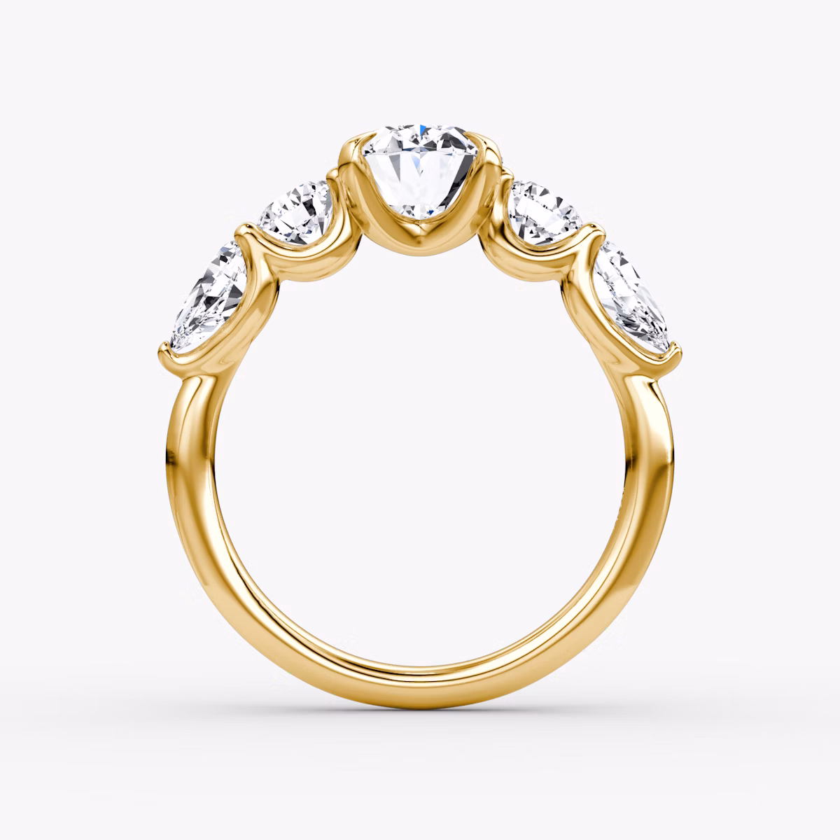 The Mixed Shape | Oval | 18k | Yellow Gold | bandAccent: Plain | sideStoneOrientation: horizontal | sideStoneShape: Round Brilliant and Pear | diamondOrientation: vertical | caratWeight: other