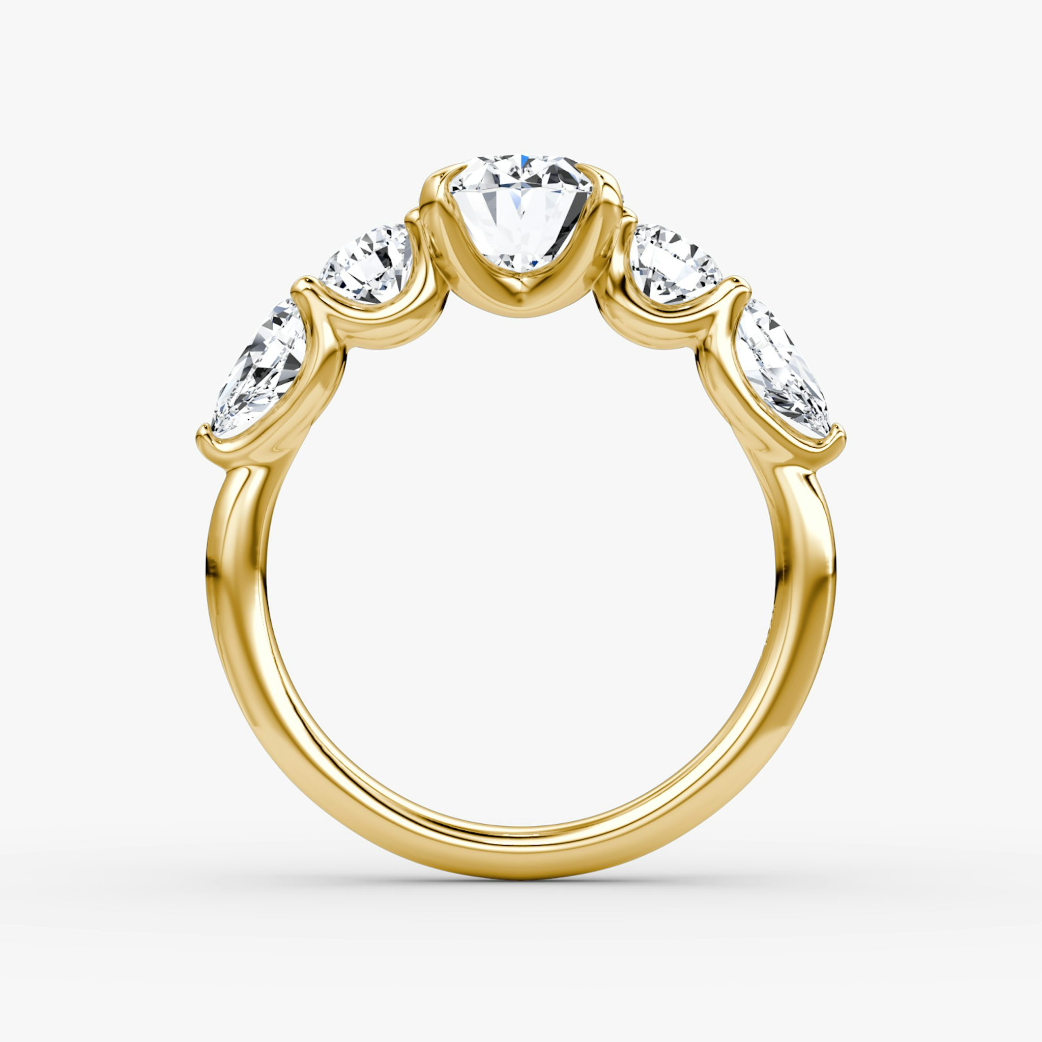 The Mixed Shape | Oval | 18k | Yellow Gold | bandAccent: Plain | sideStoneOrientation: horizontal | sideStoneShape: Round Brilliant and Pear | diamondOrientation: vertical | caratWeight: other