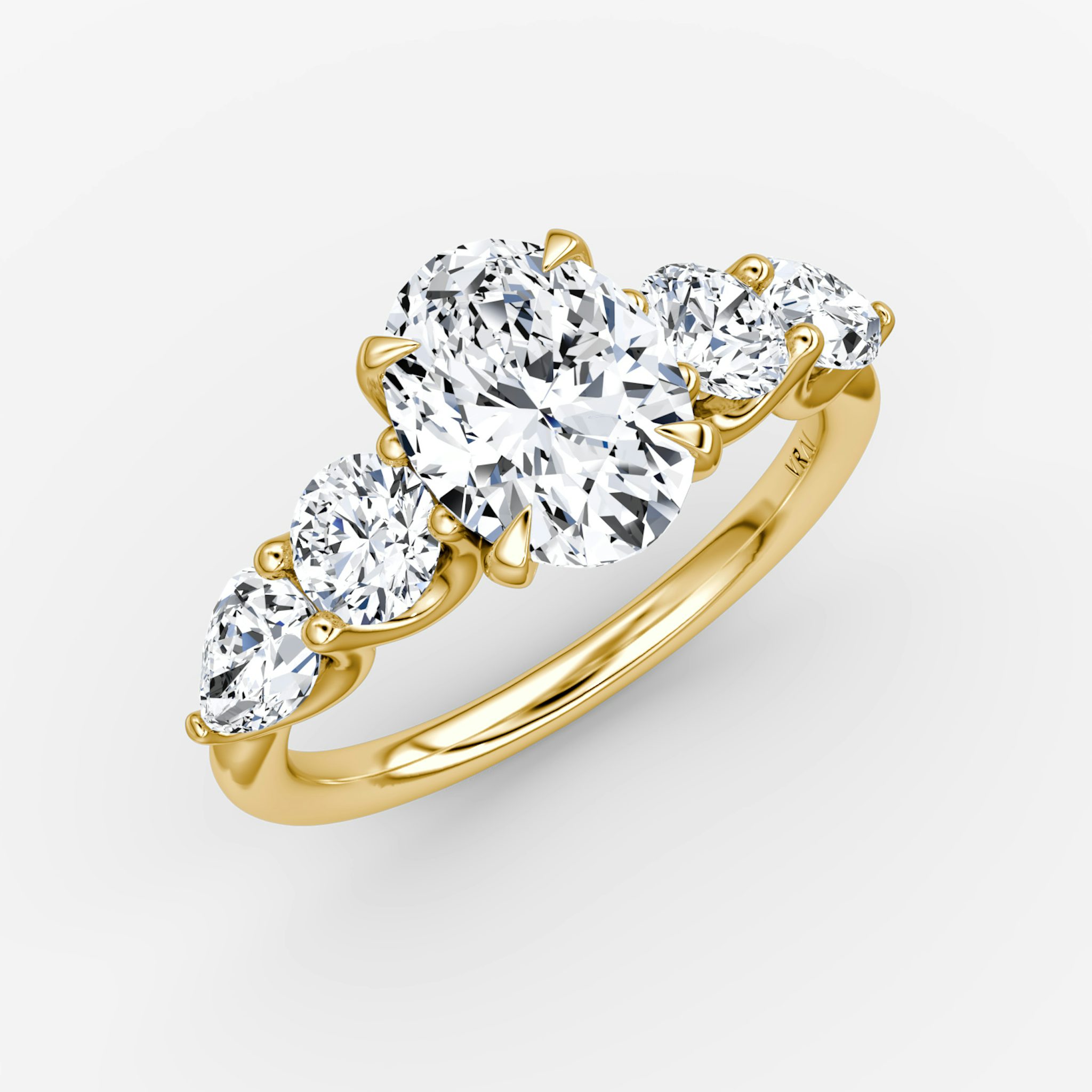 The Mixed Shape | Oval | 18k | Yellow Gold | bandAccent: Plain | sideStoneOrientation: horizontal | sideStoneShape: Round Brilliant and Pear | diamondOrientation: vertical | caratWeight: other
