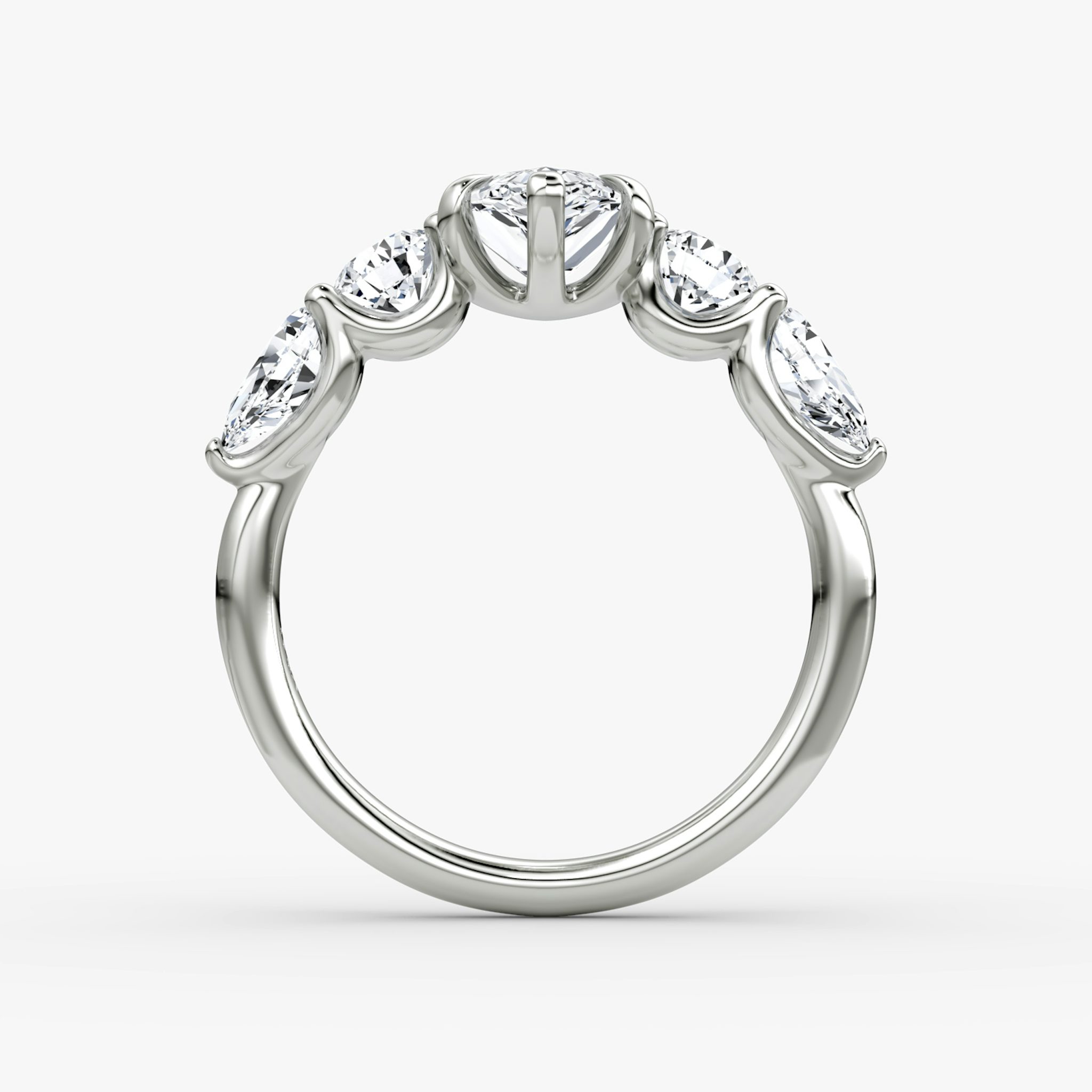 The Mixed Shape | Pear | 18k | White Gold | bandAccent: Plain | sideStoneOrientation: horizontal | sideStoneShape: Round Brilliant and Pear | diamondOrientation: vertical | caratWeight: other