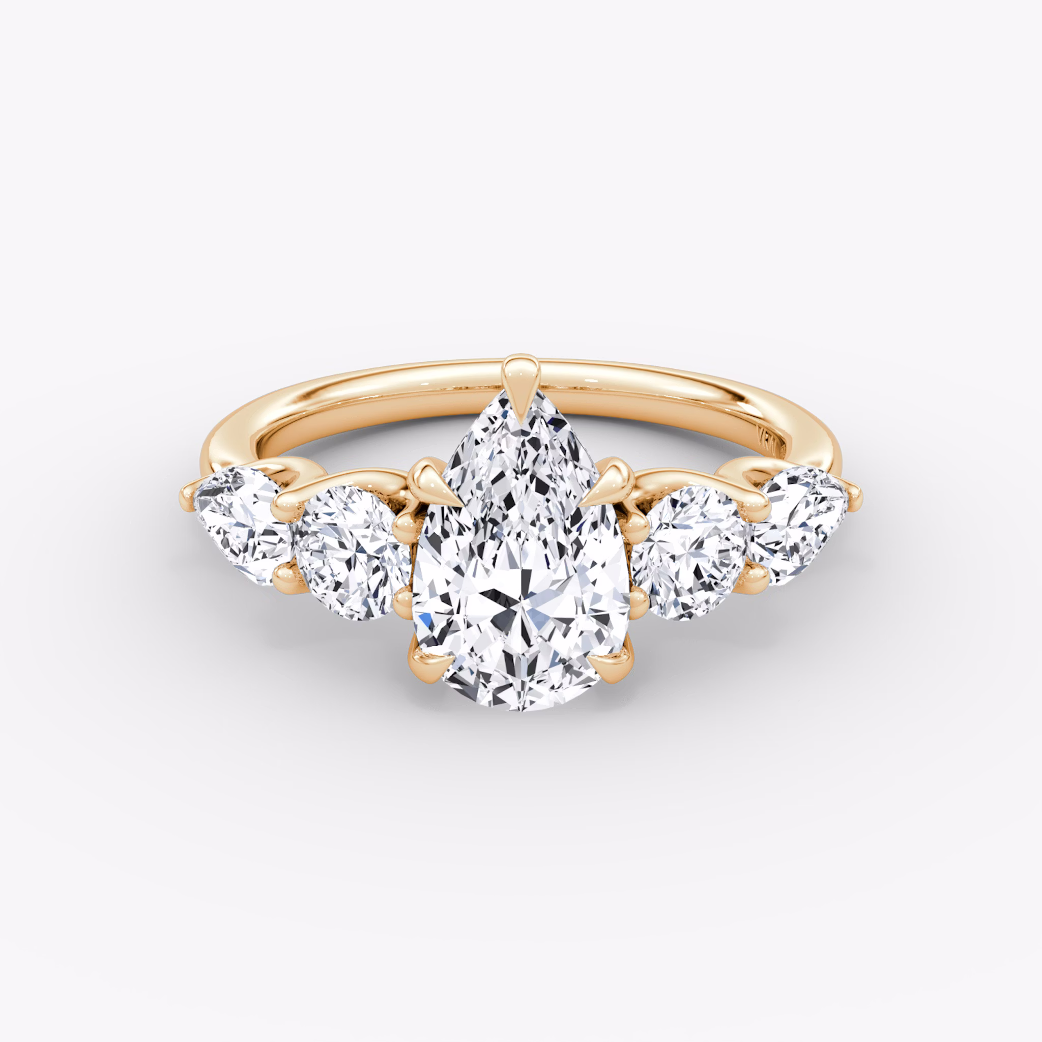 The Mixed Shape | Pear | 14k | Rose Gold | bandAccent: Plain | sideStoneOrientation: horizontal | sideStoneShape: Round Brilliant and Pear | diamondOrientation: vertical | caratWeight: other