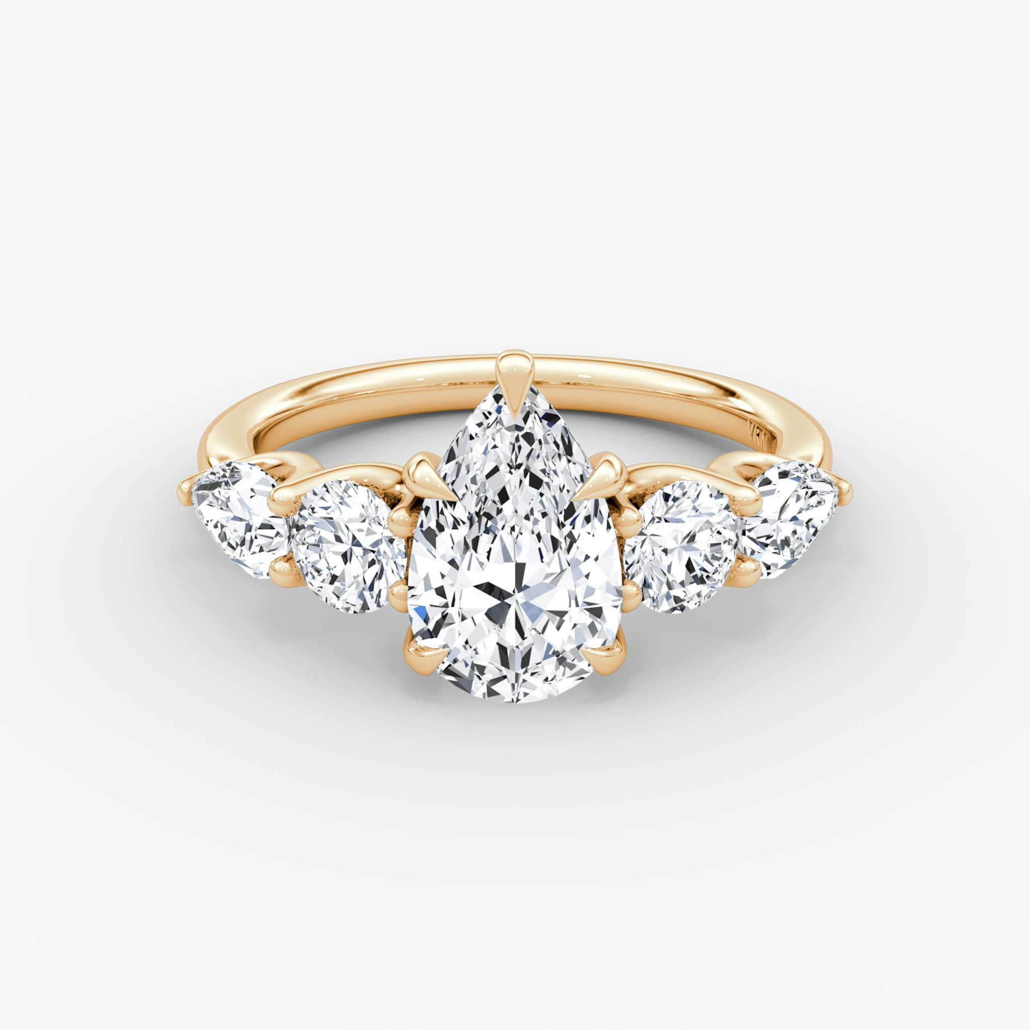 The Mixed Shape | Pear | 14k | Rose Gold | bandAccent: Plain | sideStoneOrientation: horizontal | sideStoneShape: Round Brilliant and Pear | diamondOrientation: vertical | caratWeight: other