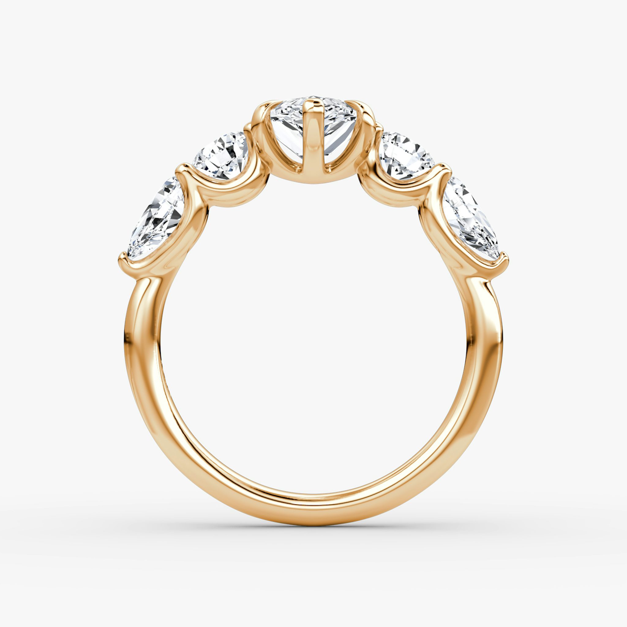 The Mixed Shape | Pear | 14k | Rose Gold | bandAccent: Plain | sideStoneOrientation: horizontal | sideStoneShape: Round Brilliant and Pear | diamondOrientation: vertical | caratWeight: other
