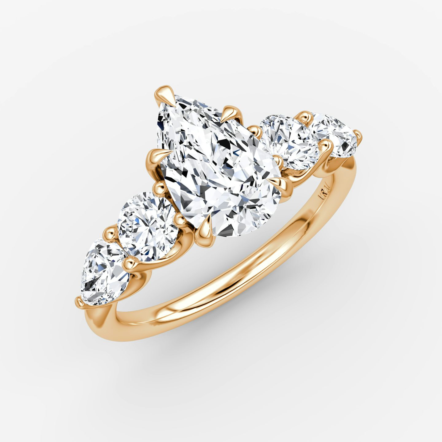 The Mixed Shape | Pear | 14k | Rose Gold | bandAccent: Plain | sideStoneOrientation: horizontal | sideStoneShape: Round Brilliant and Pear | diamondOrientation: vertical | caratWeight: other