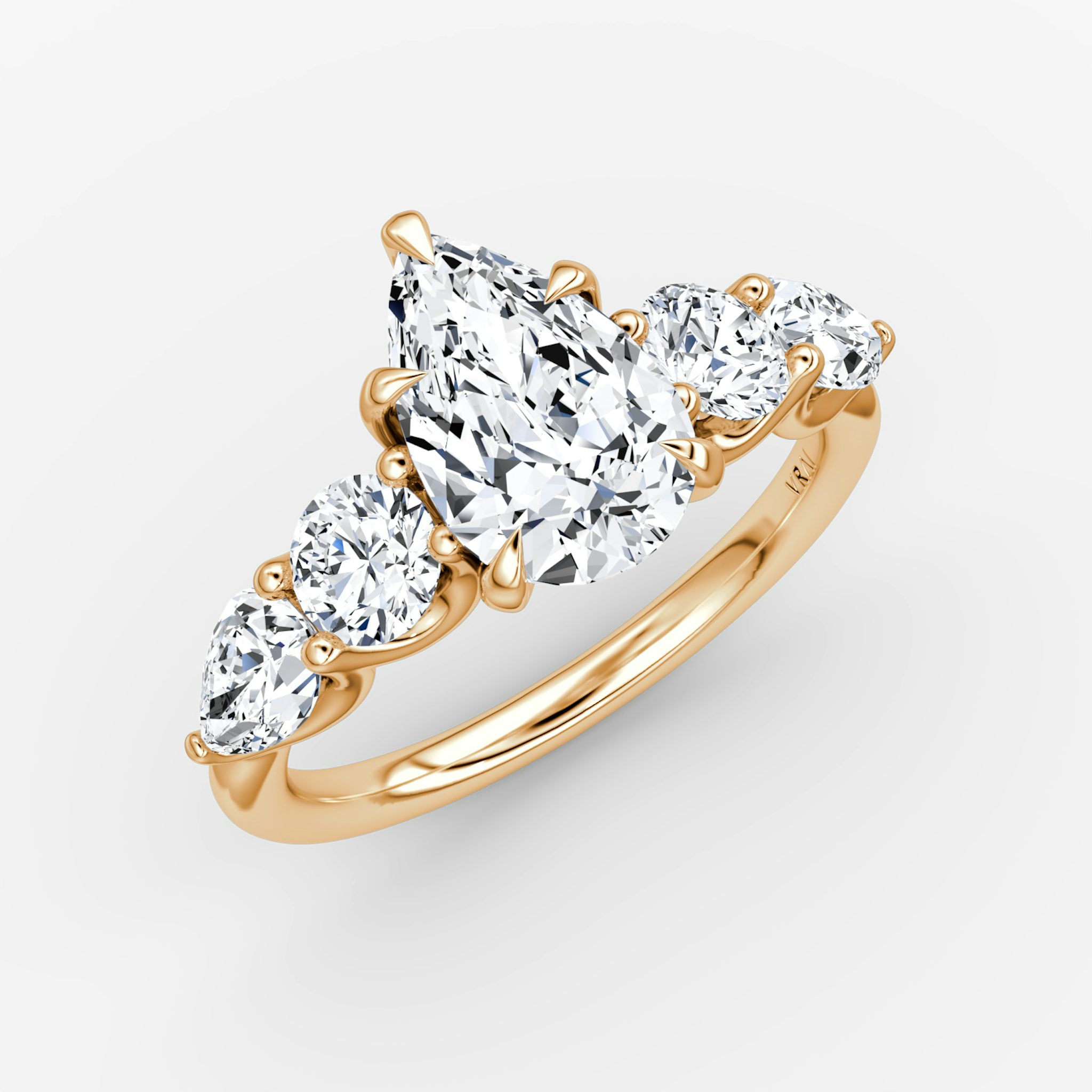 The Mixed Shape | Pear | 14k | Rose Gold | bandAccent: Plain | sideStoneOrientation: horizontal | sideStoneShape: Round Brilliant and Pear | diamondOrientation: vertical | caratWeight: other