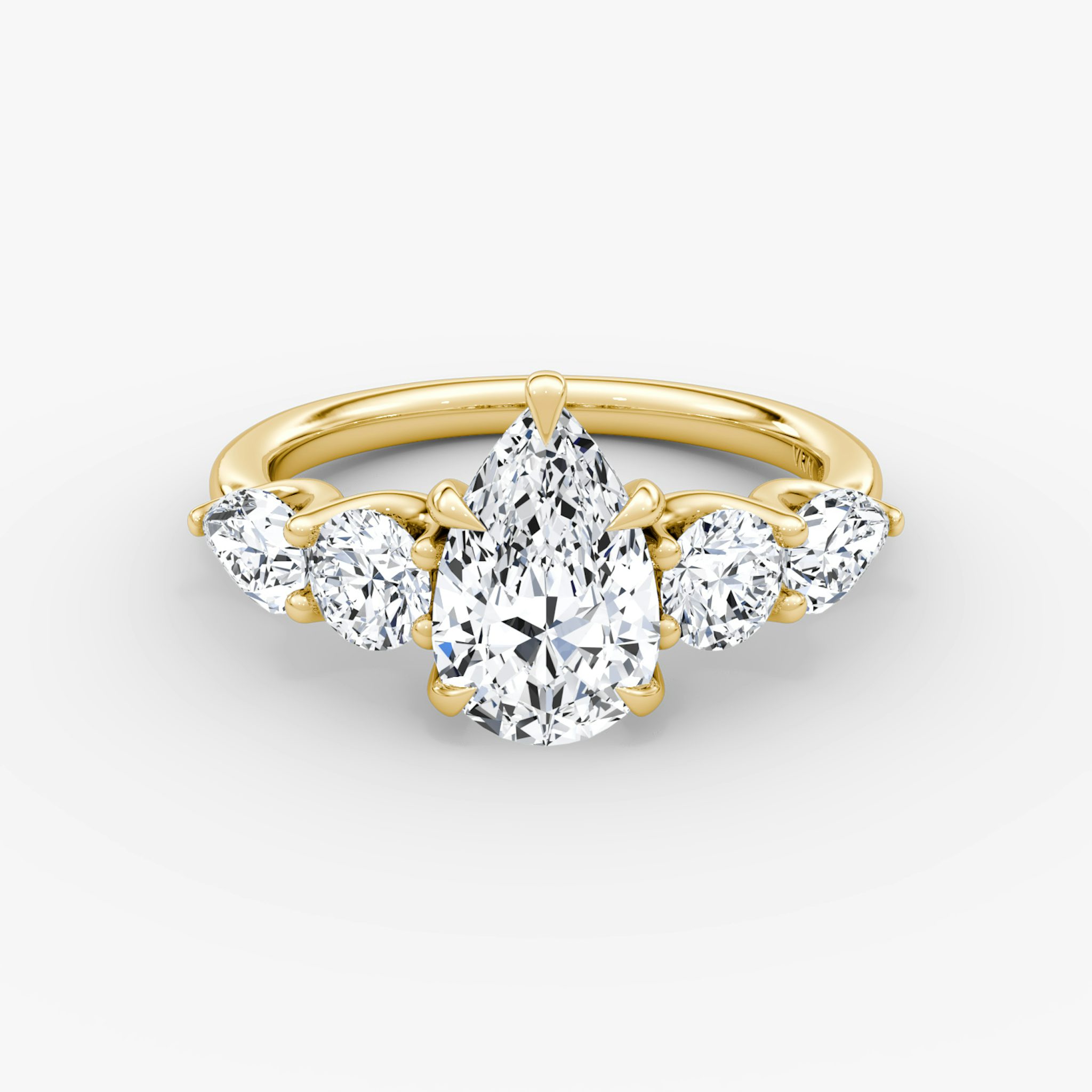 The Mixed Shape | Pear | 18k | Yellow Gold | bandAccent: Plain | sideStoneOrientation: horizontal | sideStoneShape: Round Brilliant and Pear | diamondOrientation: vertical | caratWeight: other