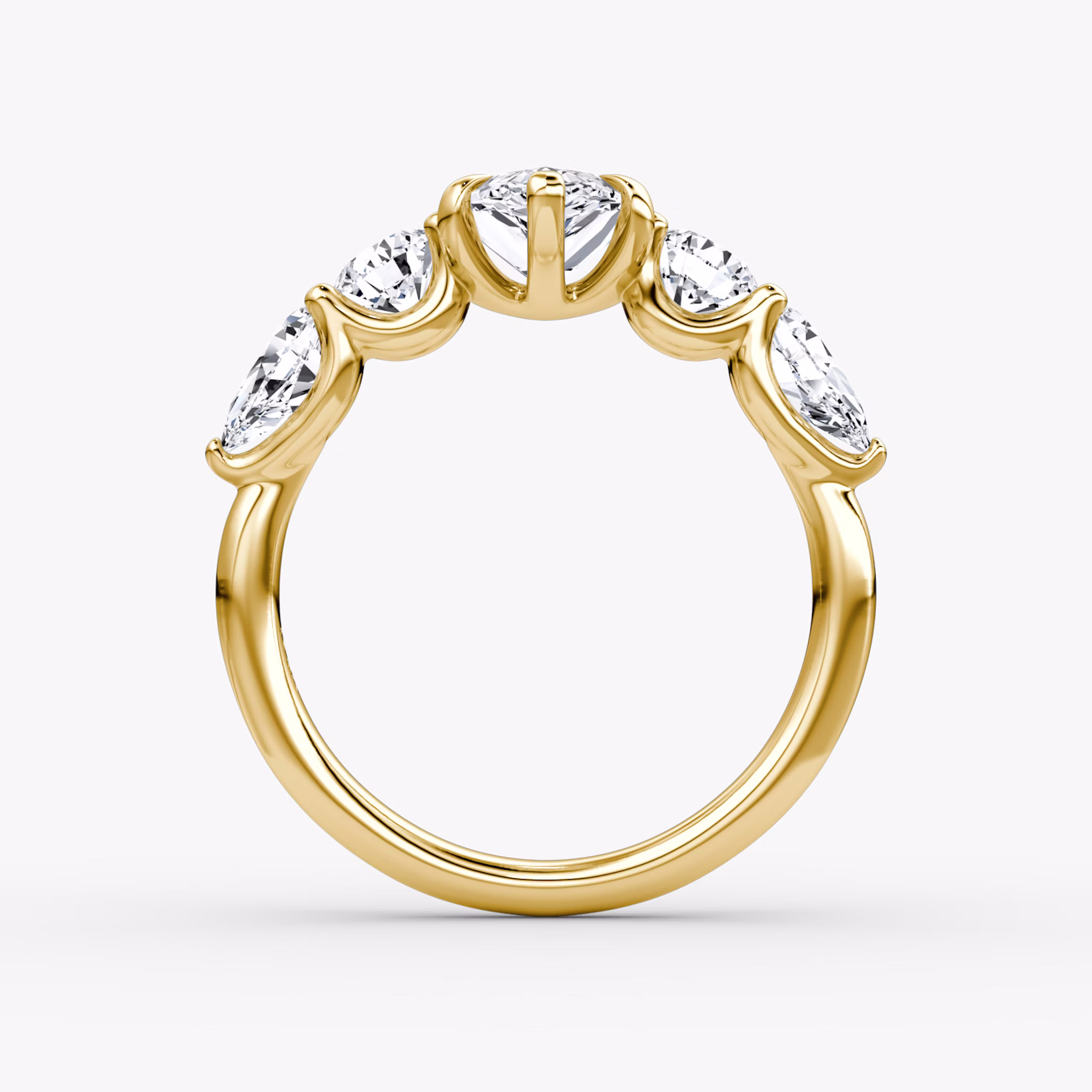 The Mixed Shape | Pear | 18k | Yellow Gold | bandAccent: Plain | sideStoneOrientation: horizontal | sideStoneShape: Round Brilliant and Pear | diamondOrientation: vertical | caratWeight: other