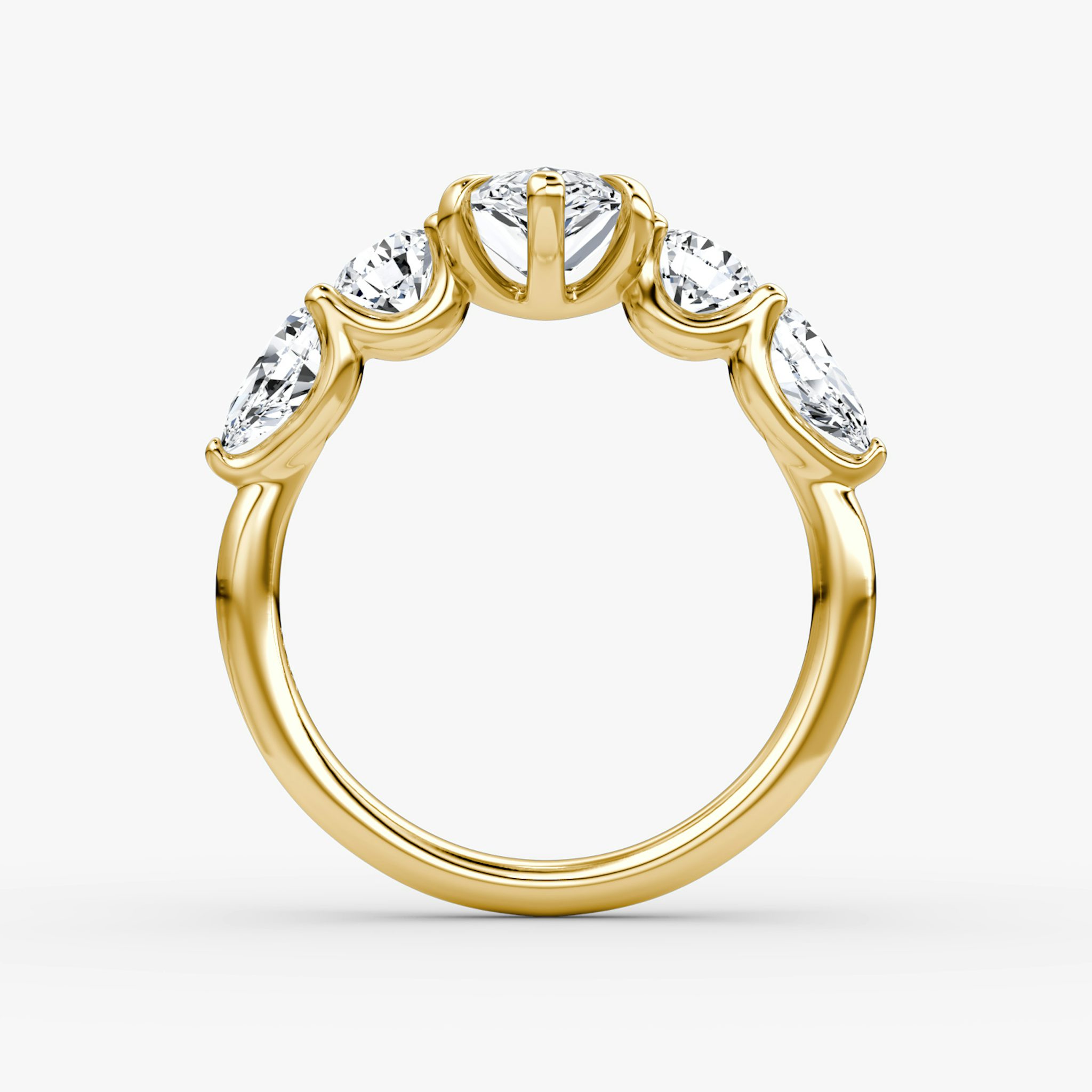 The Mixed Shape | Pear | 18k | Yellow Gold | bandAccent: Plain | sideStoneOrientation: horizontal | sideStoneShape: Round Brilliant and Pear | diamondOrientation: vertical | caratWeight: other
