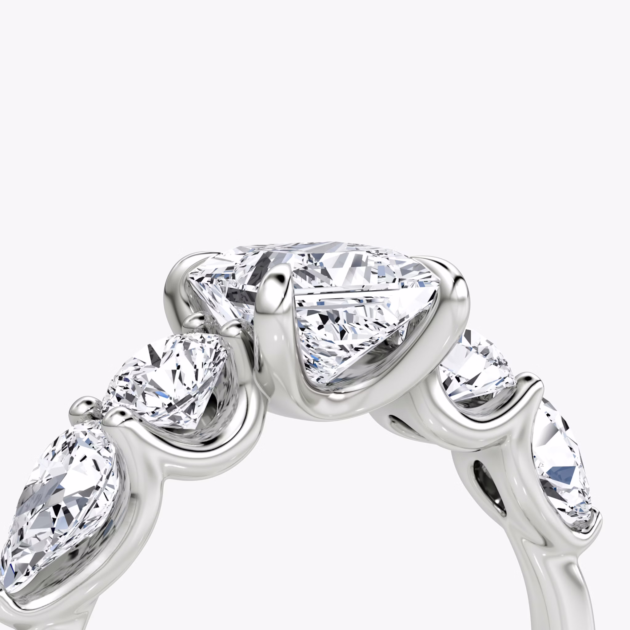 The Mixed Shape | Princess | 18k | White Gold | bandAccent: Plain | sideStoneOrientation: horizontal | sideStoneShape: Round Brilliant and Pear | diamondOrientation: vertical | caratWeight: other