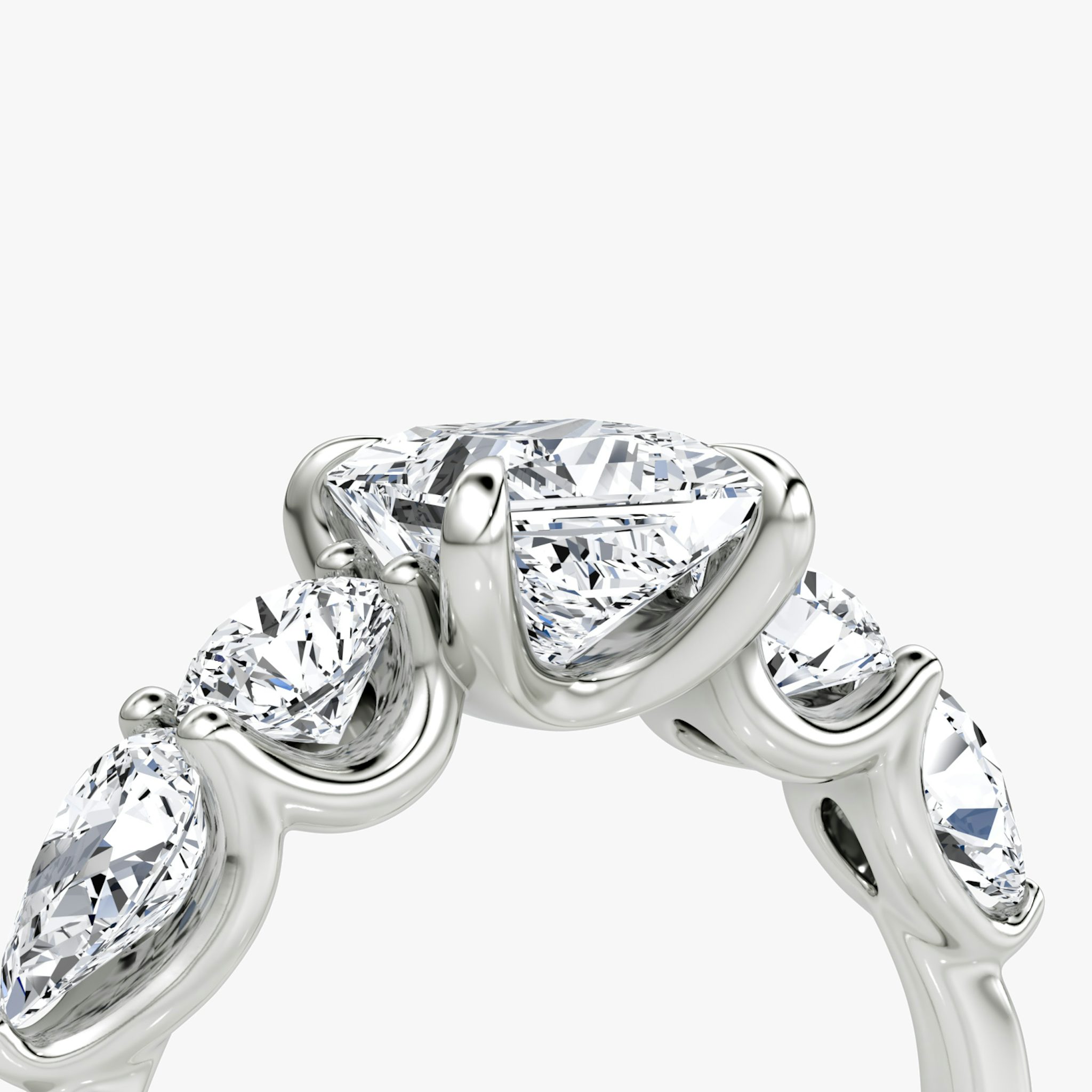 The Mixed Shape | Princess | 18k | White Gold | bandAccent: Plain | sideStoneOrientation: horizontal | sideStoneShape: Round Brilliant and Pear | diamondOrientation: vertical | caratWeight: other