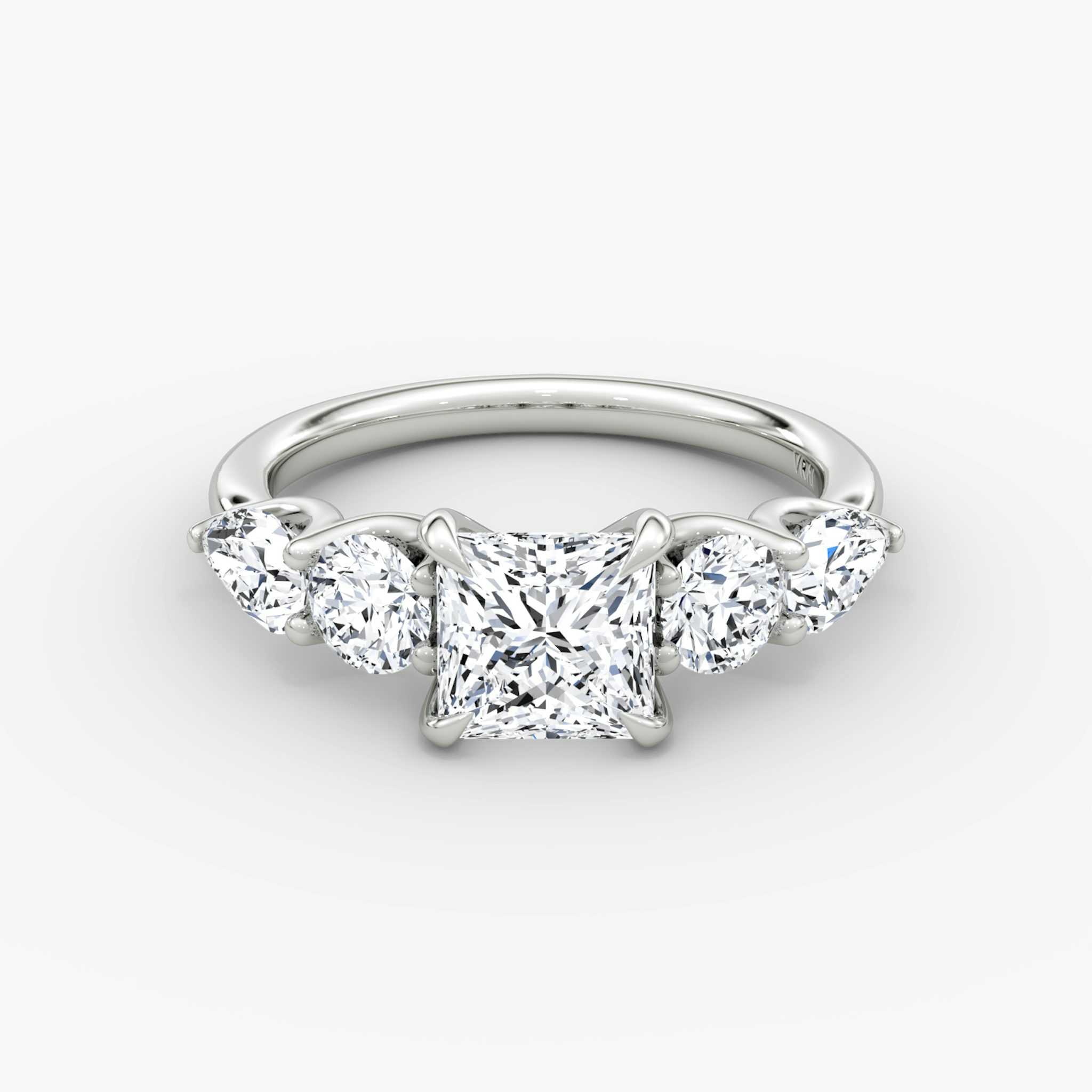 The Mixed Shape | Princess | 18k | White Gold | bandAccent: Plain | sideStoneOrientation: horizontal | sideStoneShape: Round Brilliant and Pear | diamondOrientation: vertical | caratWeight: other