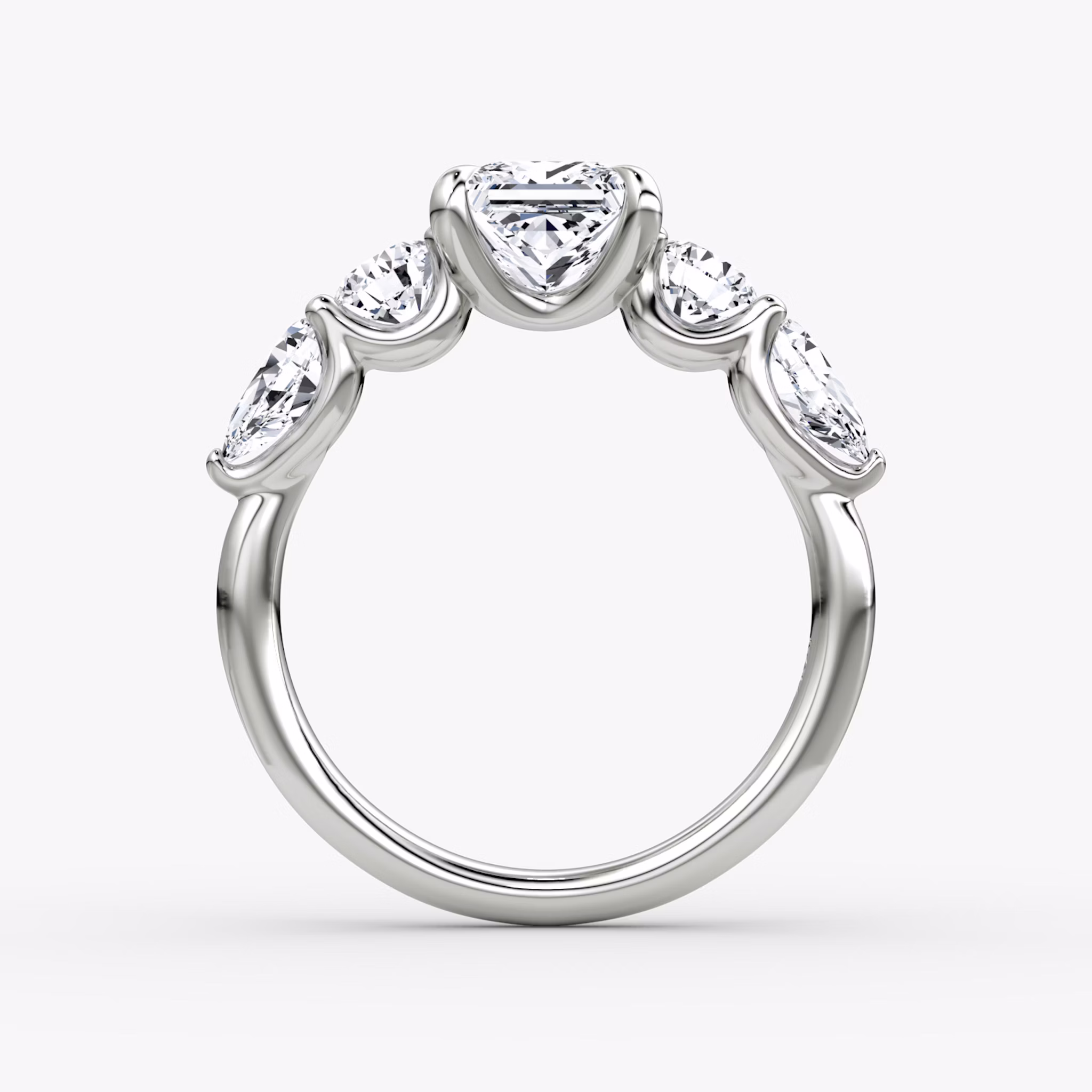 The Mixed Shape | Princess | 18k | White Gold | bandAccent: Plain | sideStoneOrientation: horizontal | sideStoneShape: Round Brilliant and Pear | diamondOrientation: vertical | caratWeight: other