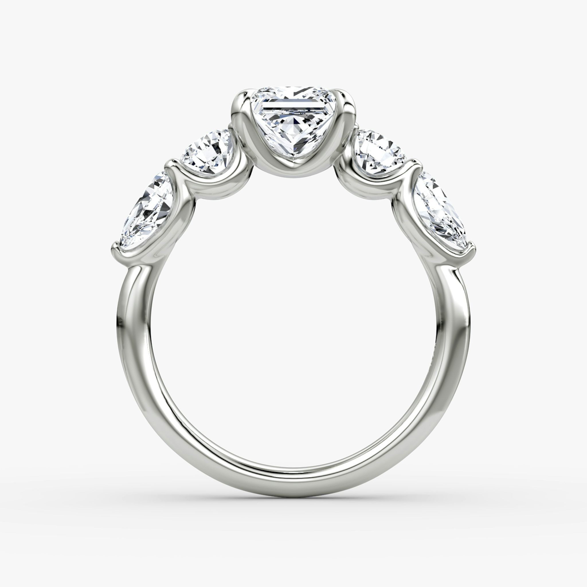 The Mixed Shape | Princess | 18k | White Gold | bandAccent: Plain | sideStoneOrientation: horizontal | sideStoneShape: Round Brilliant and Pear | diamondOrientation: vertical | caratWeight: other