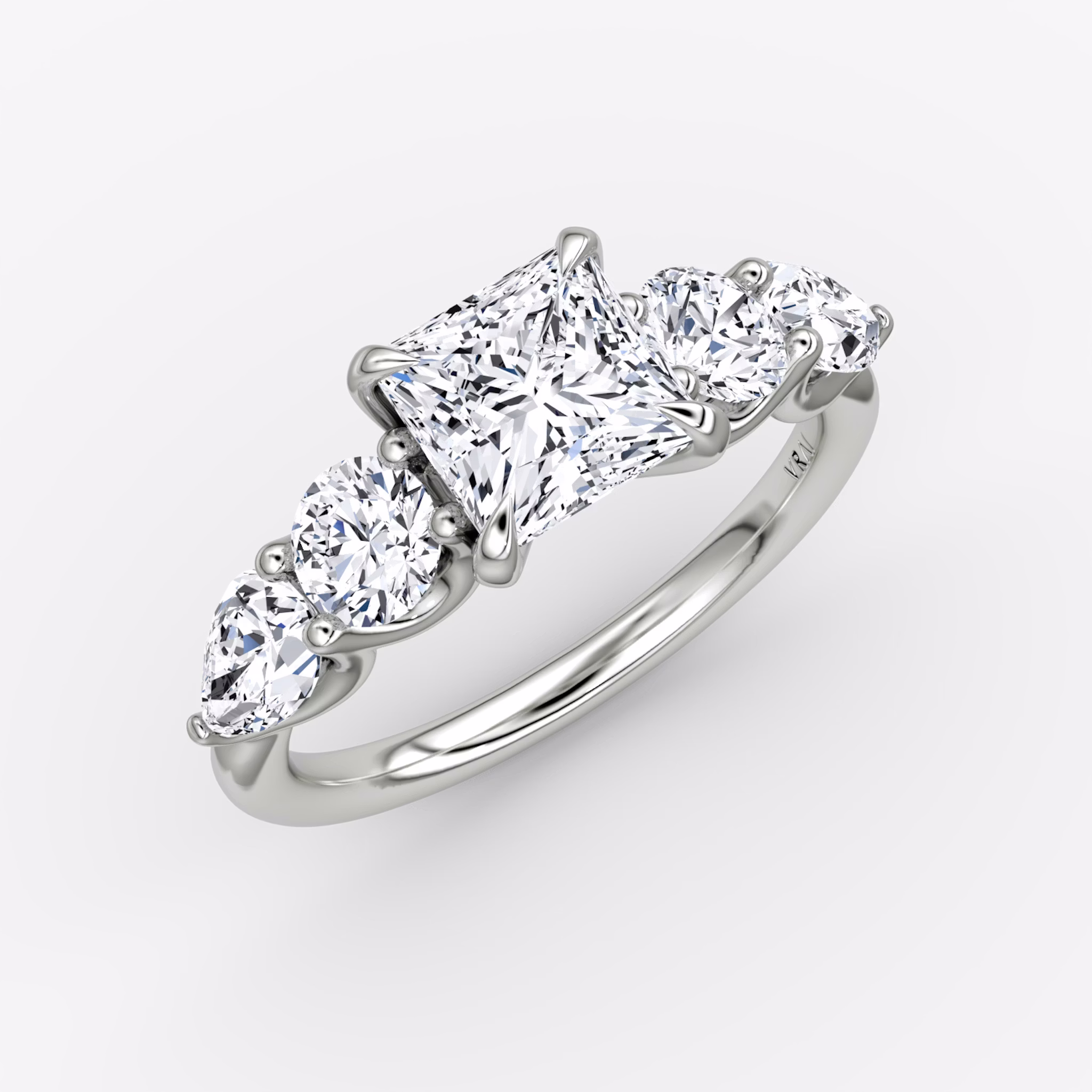 The Mixed Shape | Princess | 18k | White Gold | bandAccent: Plain | sideStoneOrientation: horizontal | sideStoneShape: Round Brilliant and Pear | diamondOrientation: vertical | caratWeight: other