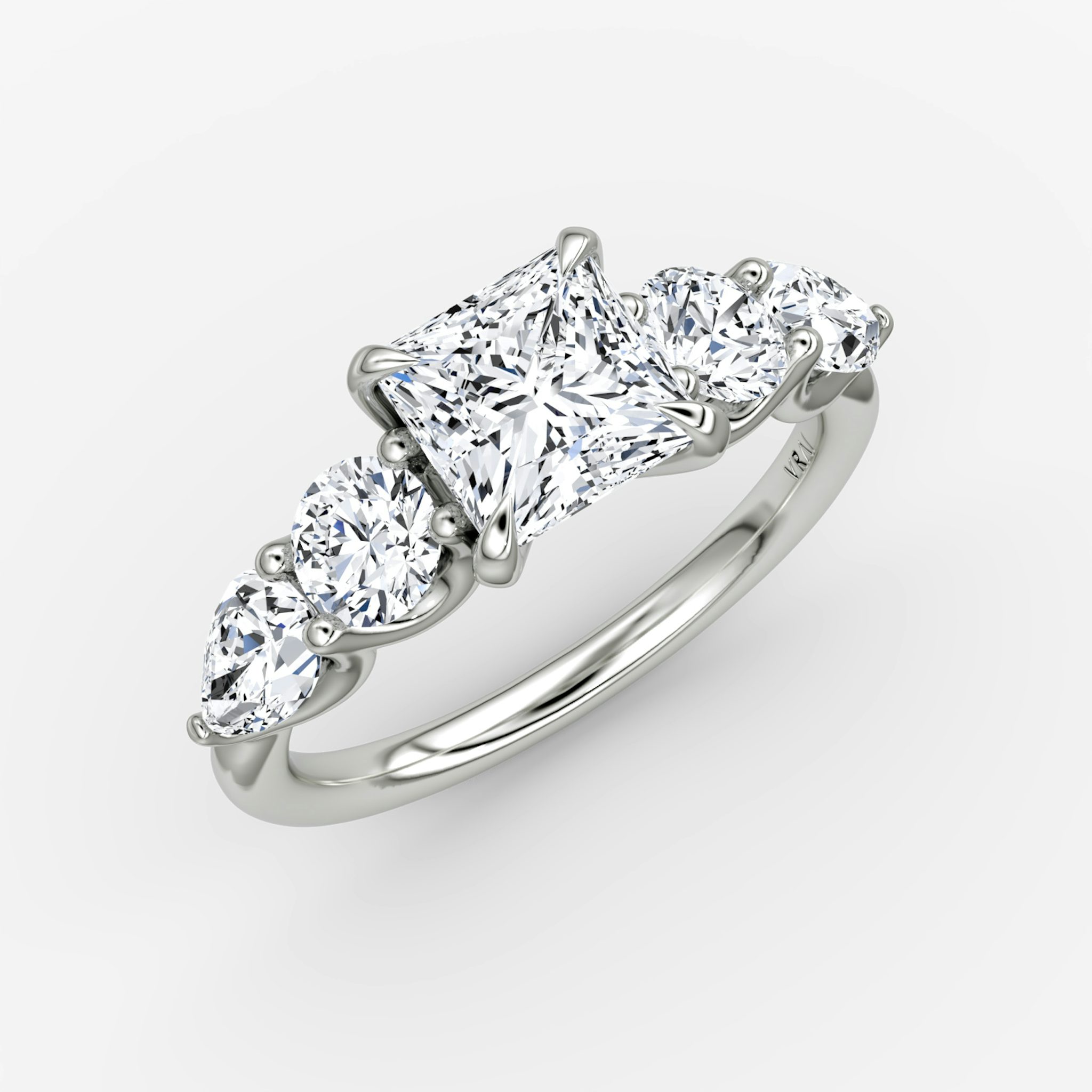 The Mixed Shape | Princess | 18k | White Gold | bandAccent: Plain | sideStoneOrientation: horizontal | sideStoneShape: Round Brilliant and Pear | diamondOrientation: vertical | caratWeight: other