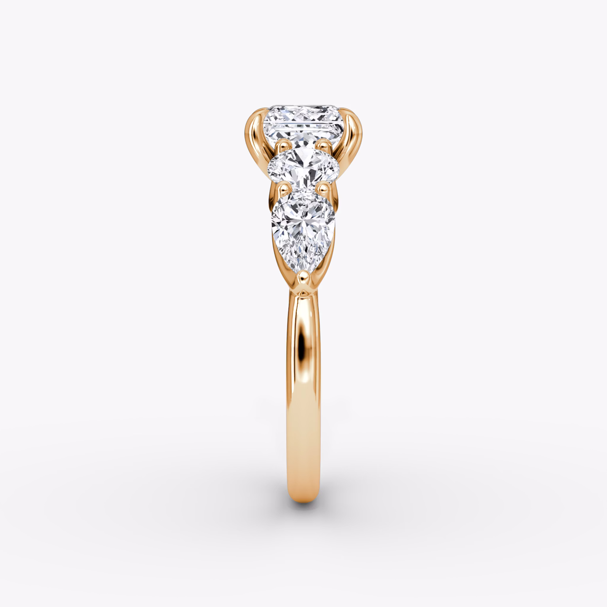 The Mixed Shape | Princess | 14k | Rose Gold | bandAccent: Plain | sideStoneOrientation: horizontal | sideStoneShape: Round Brilliant and Pear | diamondOrientation: vertical | caratWeight: other
