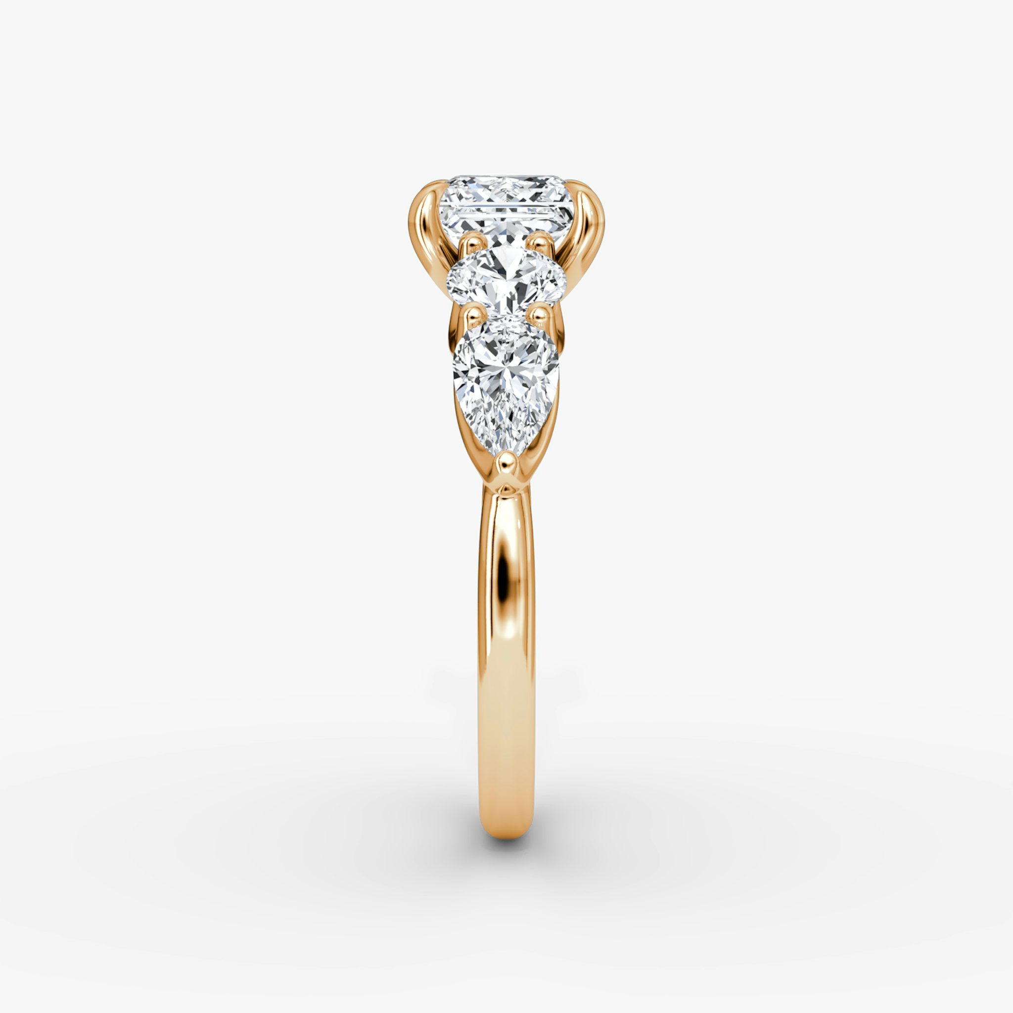 The Mixed Shape | Princess | 14k | Rose Gold | bandAccent: Plain | sideStoneOrientation: horizontal | sideStoneShape: Round Brilliant and Pear | diamondOrientation: vertical | caratWeight: other
