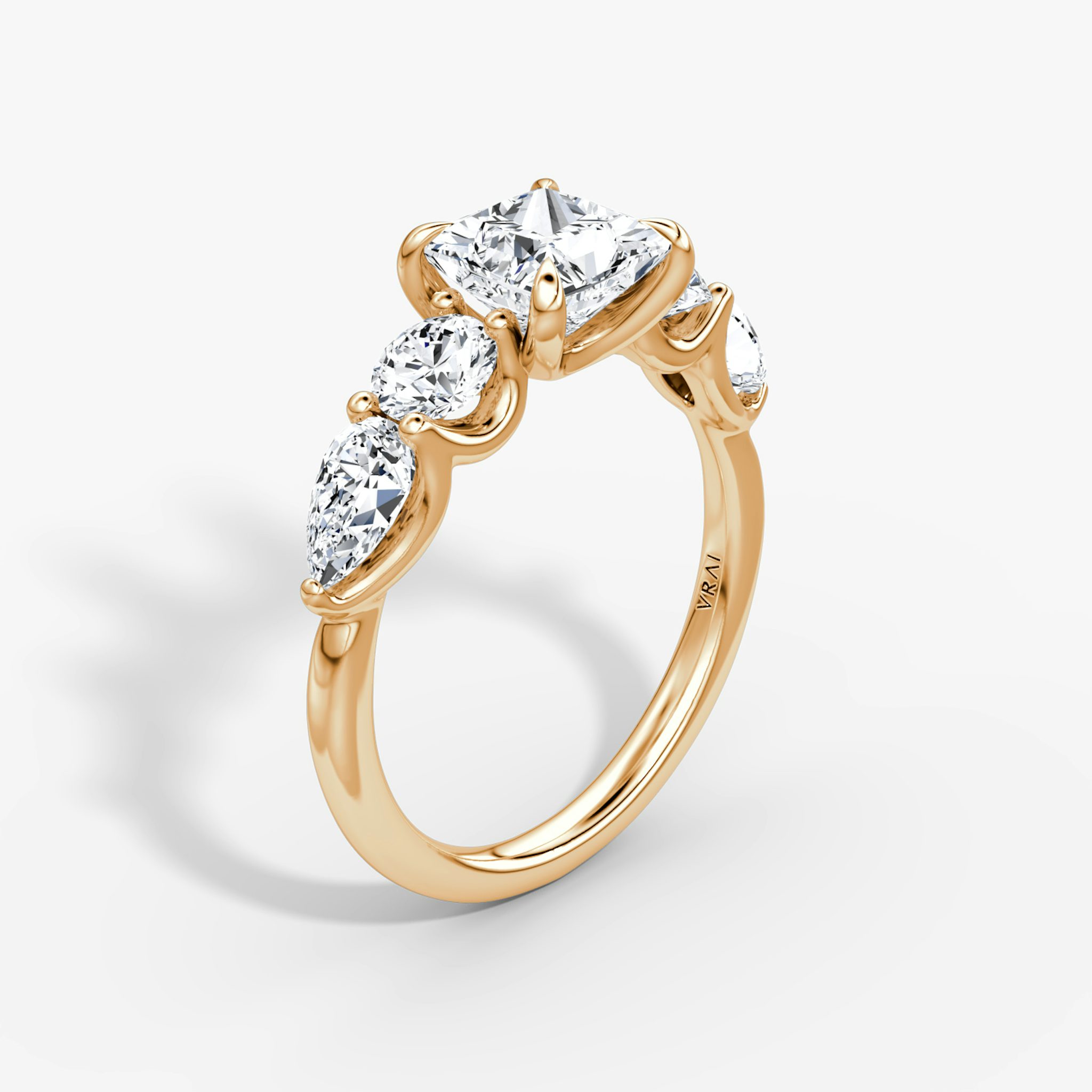 The Mixed Shape | Princess | 14k | Rose Gold | bandAccent: Plain | sideStoneOrientation: horizontal | sideStoneShape: Round Brilliant and Pear | diamondOrientation: vertical | caratWeight: other