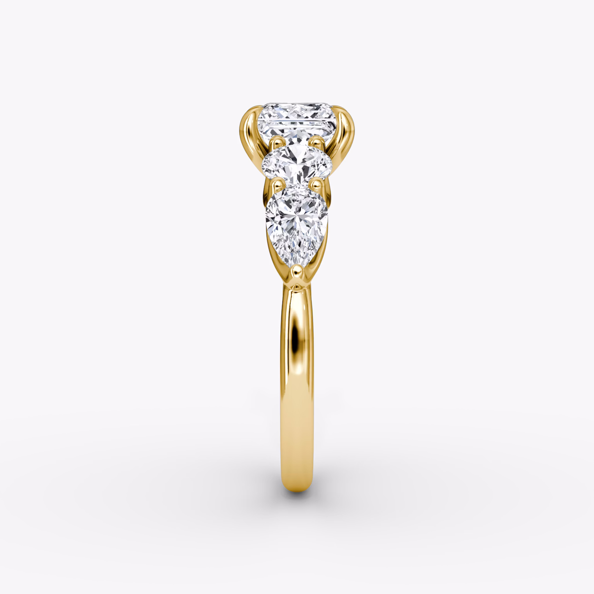 The Mixed Shape | Princess | 18k | Yellow Gold | bandAccent: Plain | sideStoneOrientation: horizontal | sideStoneShape: Round Brilliant and Pear | diamondOrientation: vertical | caratWeight: other