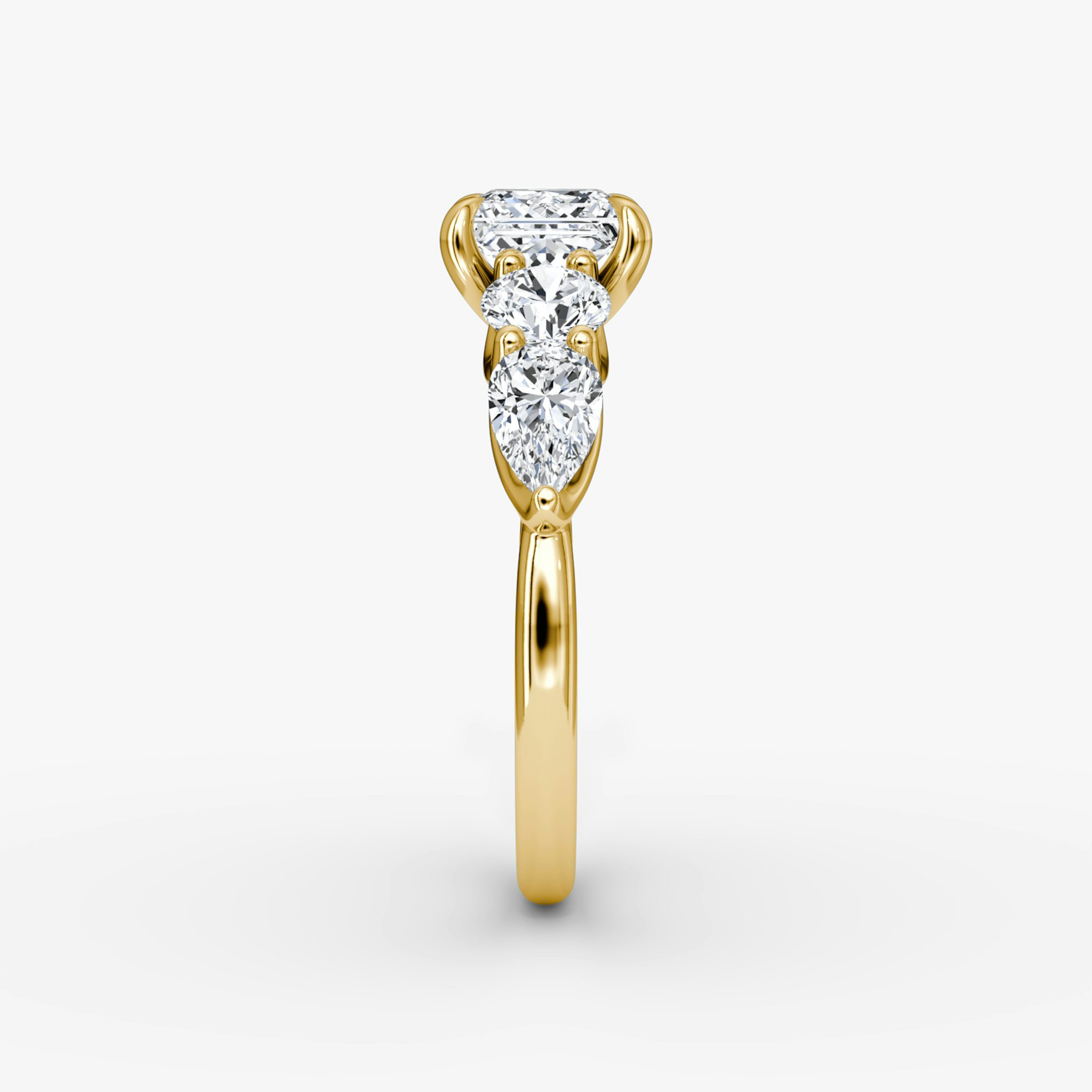 The Mixed Shape | Princess | 18k | Yellow Gold | bandAccent: Plain | sideStoneOrientation: horizontal | sideStoneShape: Round Brilliant and Pear | diamondOrientation: vertical | caratWeight: other