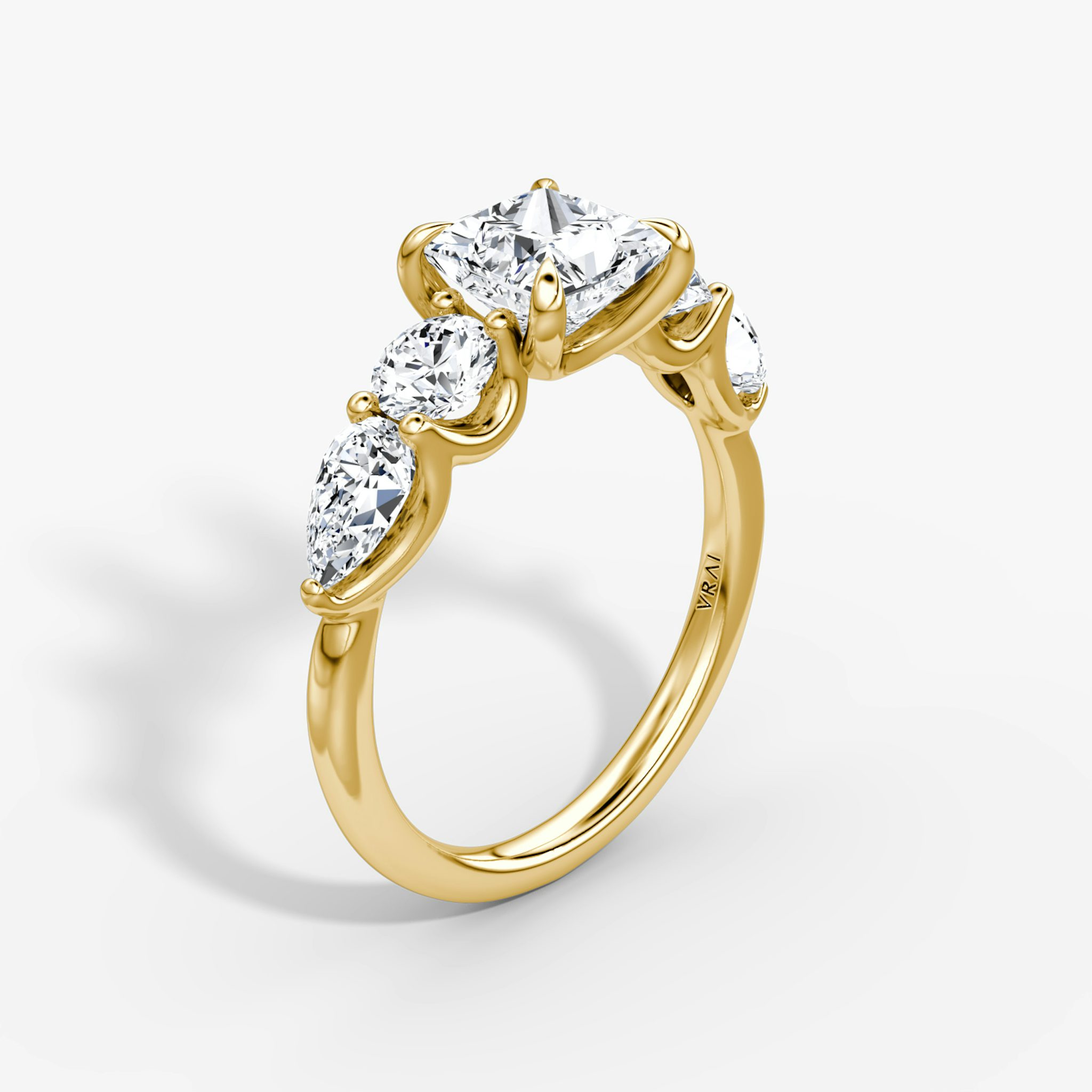 The Mixed Shape | Princess | 18k | Yellow Gold | bandAccent: Plain | sideStoneOrientation: horizontal | sideStoneShape: Round Brilliant and Pear | diamondOrientation: vertical | caratWeight: other