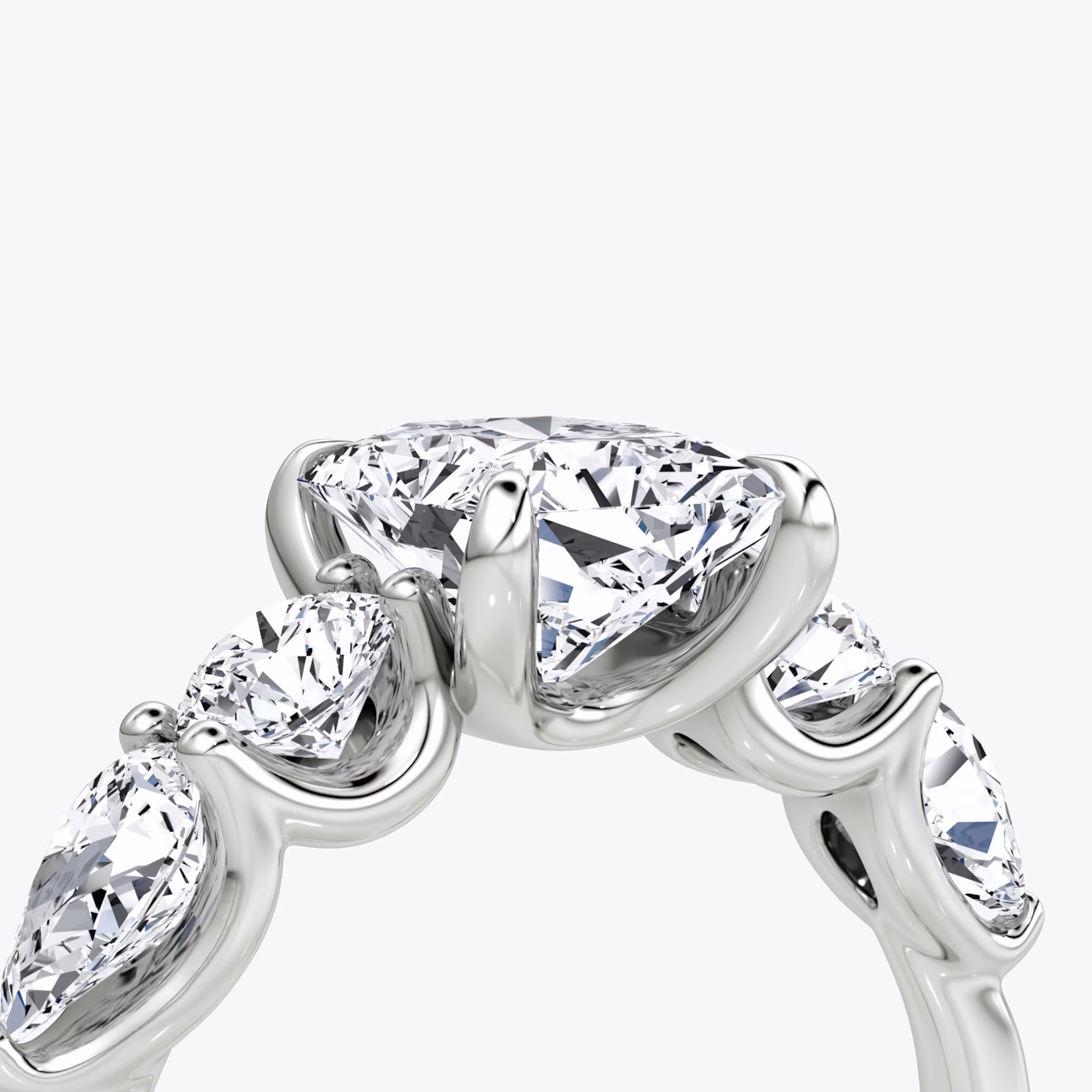 The Mixed Shape | Radiant | 18k | White Gold | bandAccent: Plain | sideStoneOrientation: horizontal | sideStoneShape: Round Brilliant and Pear | diamondOrientation: vertical | caratWeight: other