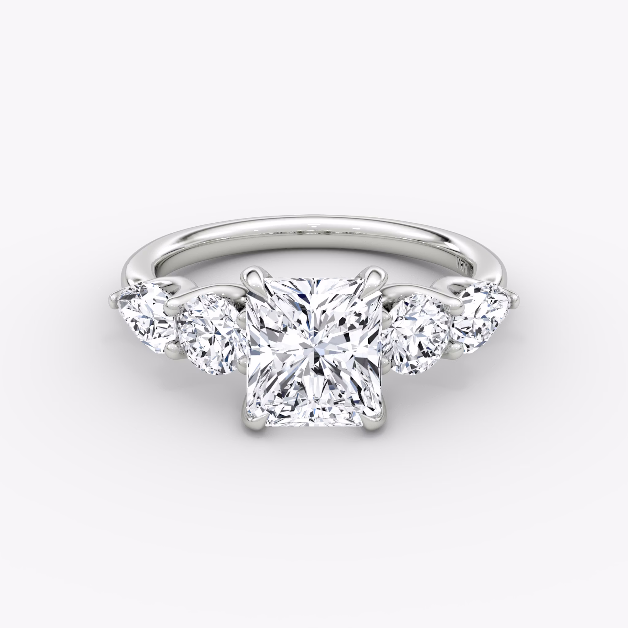 The Mixed Shape | Radiant | 18k | White Gold | bandAccent: Plain | sideStoneOrientation: horizontal | sideStoneShape: Round Brilliant and Pear | diamondOrientation: vertical | caratWeight: other