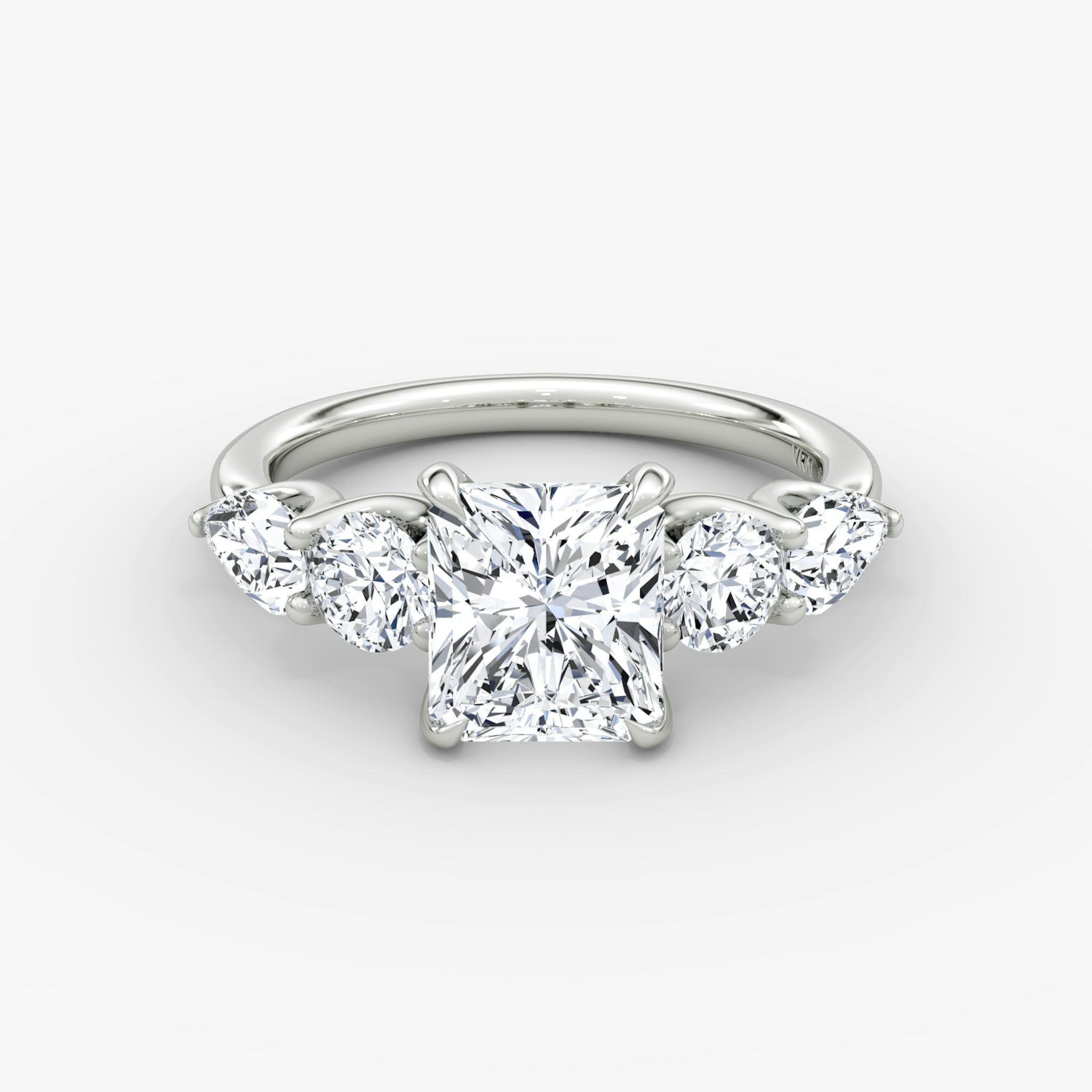 The Mixed Shape | Radiant | 18k | White Gold | bandAccent: Plain | sideStoneOrientation: horizontal | sideStoneShape: Round Brilliant and Pear | diamondOrientation: vertical | caratWeight: other