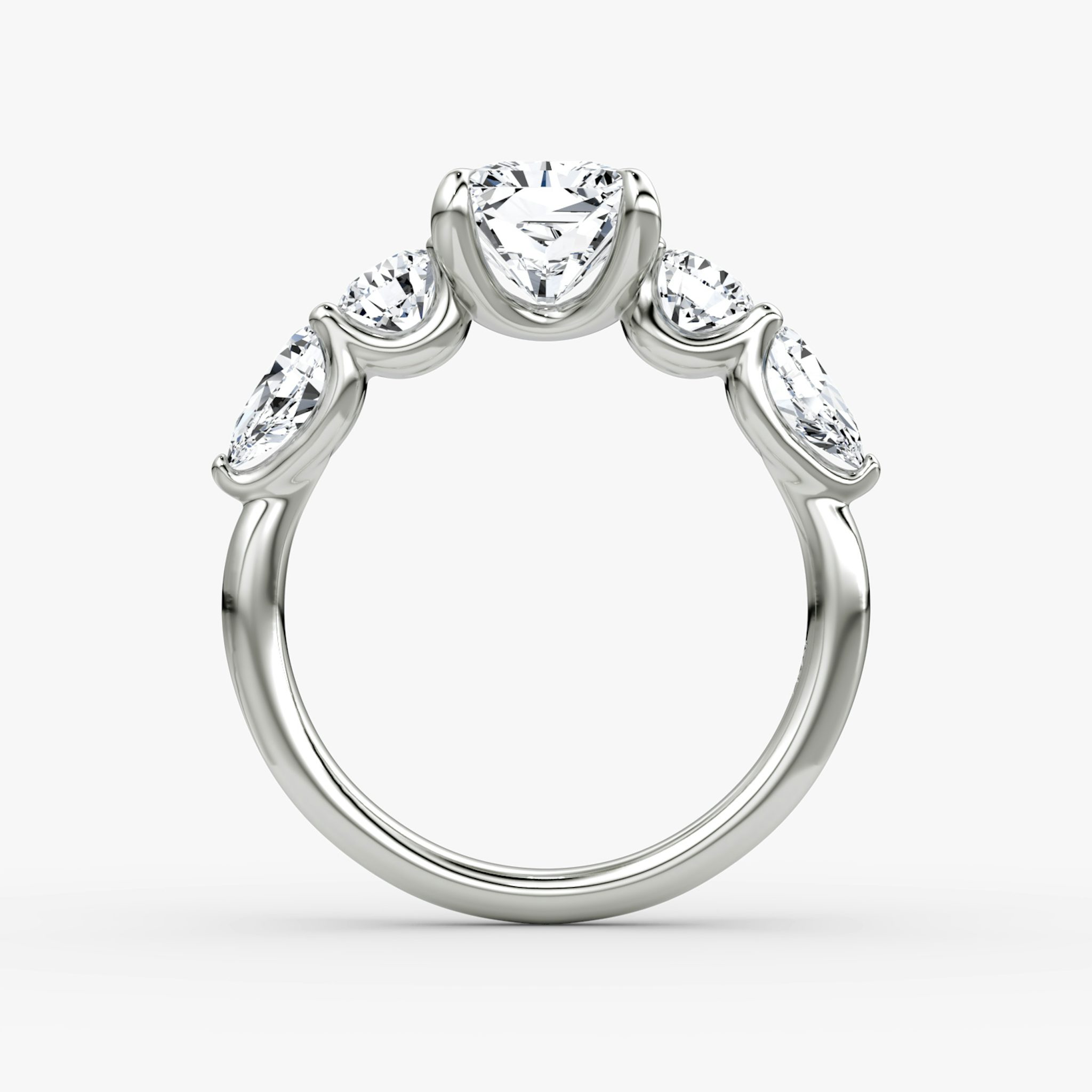 The Mixed Shape | Radiant | 18k | White Gold | bandAccent: Plain | sideStoneOrientation: horizontal | sideStoneShape: Round Brilliant and Pear | diamondOrientation: vertical | caratWeight: other