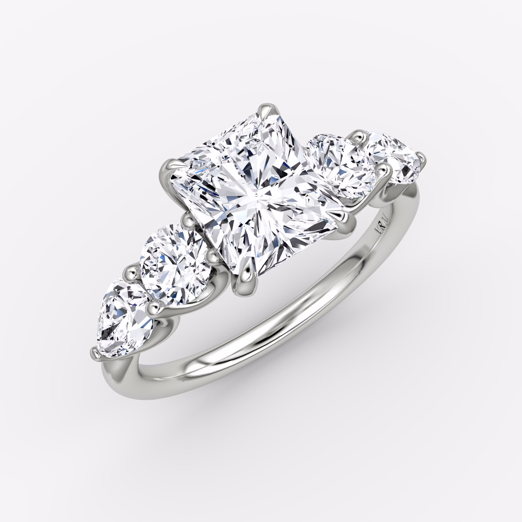 The Mixed Shape | Radiant | 18k | White Gold | bandAccent: Plain | sideStoneOrientation: horizontal | sideStoneShape: Round Brilliant and Pear | diamondOrientation: vertical | caratWeight: other