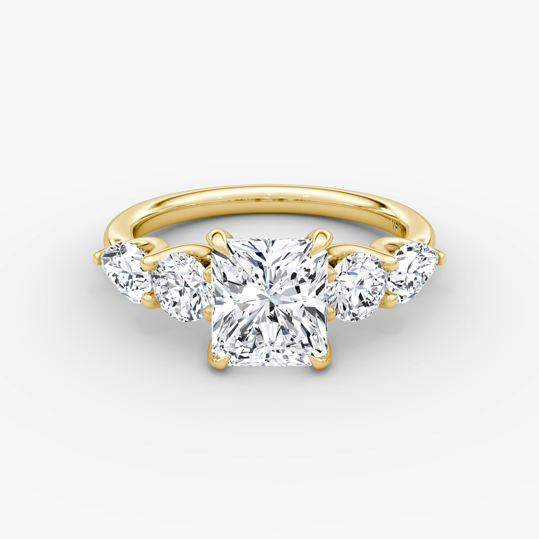 The Mixed Shape | Radiant | 18k | Yellow Gold | bandAccent: Plain | sideStoneOrientation: horizontal | sideStoneShape: Round Brilliant and Pear | diamondOrientation: vertical | caratWeight: other