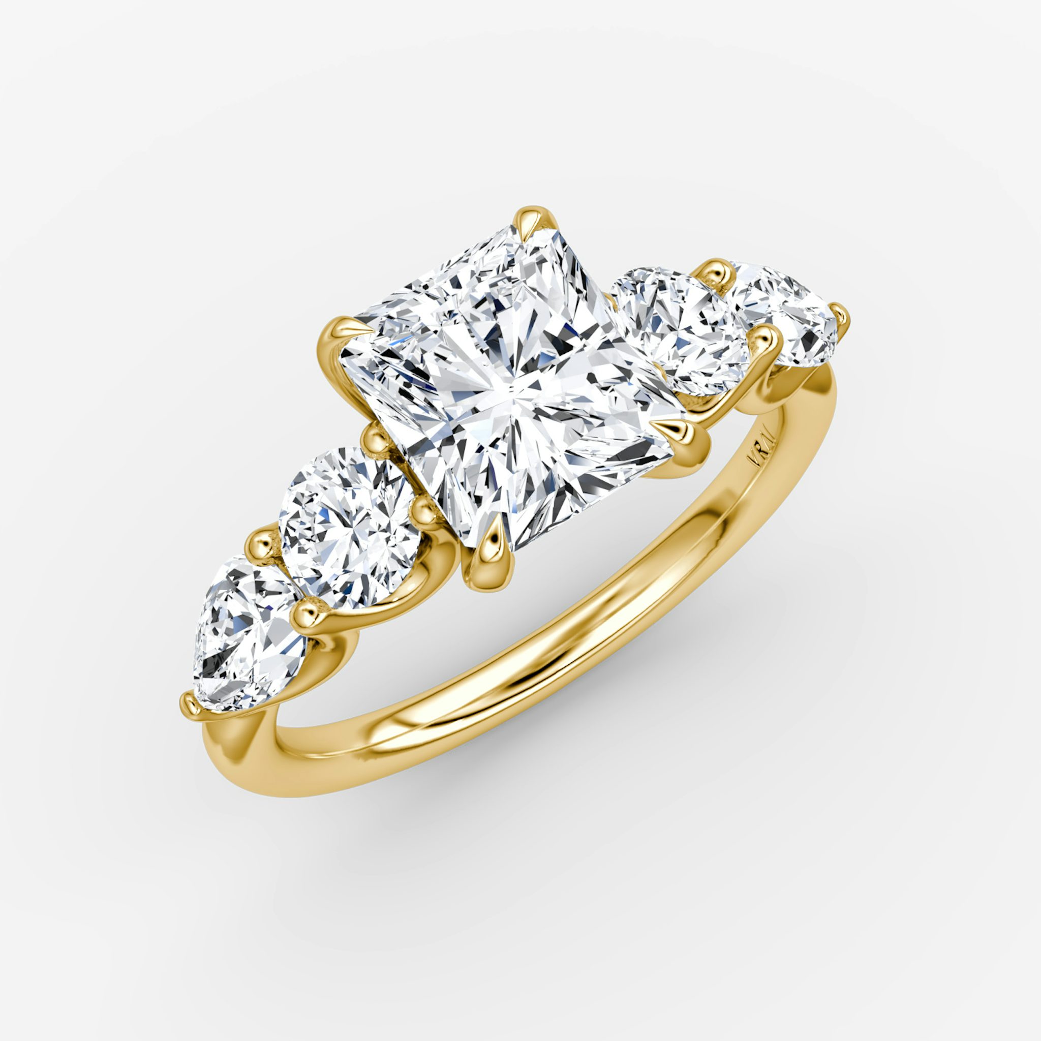 The Mixed Shape | Radiant | 18k | Yellow Gold | bandAccent: Plain | sideStoneOrientation: horizontal | sideStoneShape: Round Brilliant and Pear | diamondOrientation: vertical | caratWeight: other