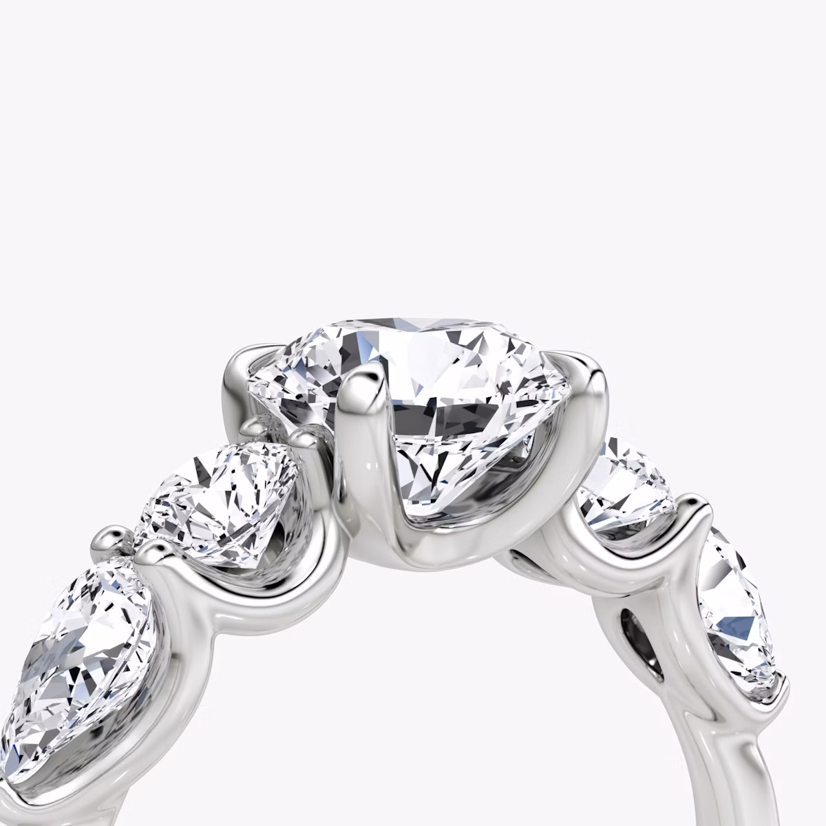 The Mixed Shape | Round Brilliant | 18k | White Gold | bandAccent: Plain | caratWeight: other | sideStoneOrientation: horizontal | sideStoneShape: Round Brilliant and Pear | diamondOrientation: vertical