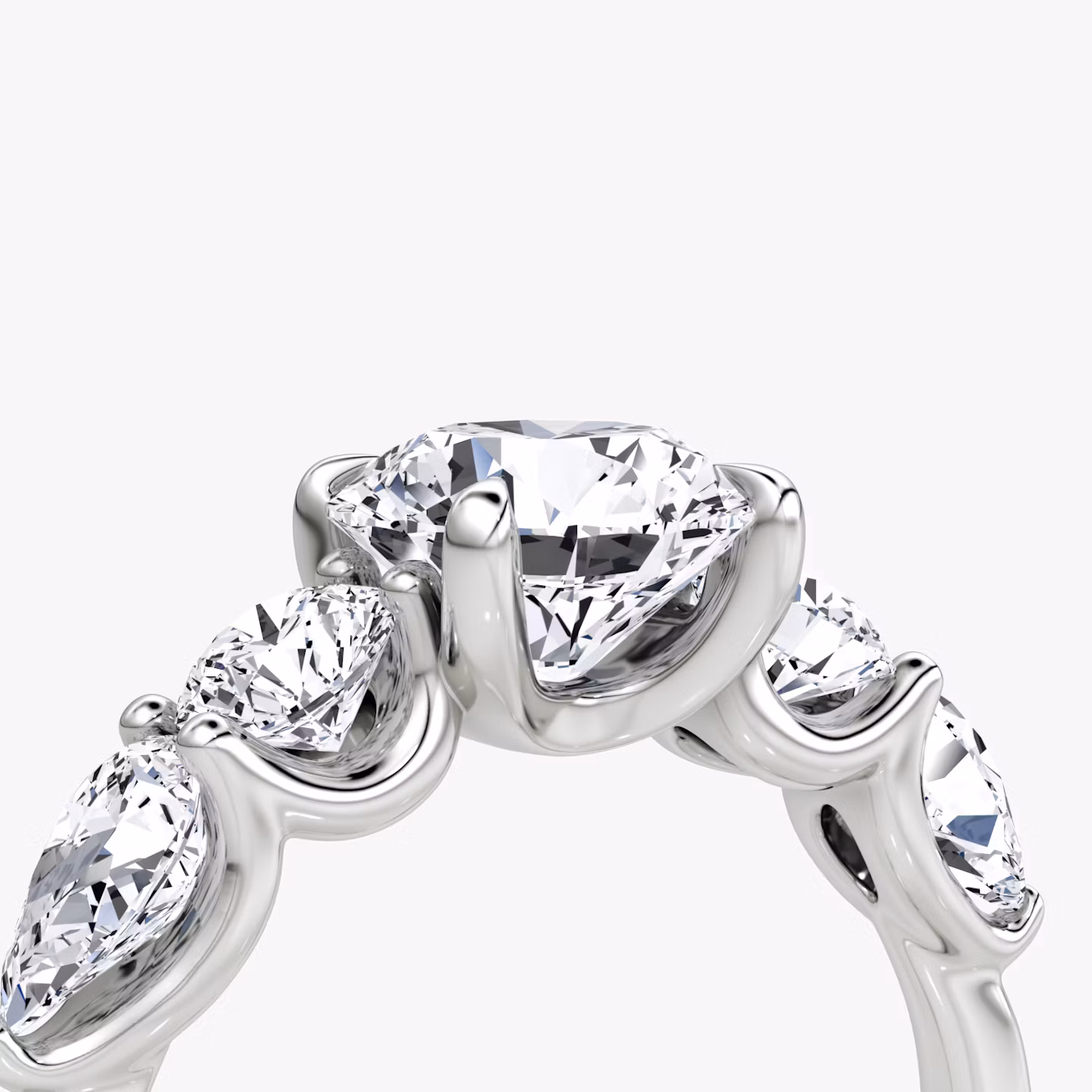 The Mixed Shape | Round Brilliant | 18k | White Gold | bandAccent: Plain | caratWeight: 1.0ct | sideStoneOrientation: horizontal | sideStoneShape: Round Brilliant and Pear | diamondOrientation: vertical