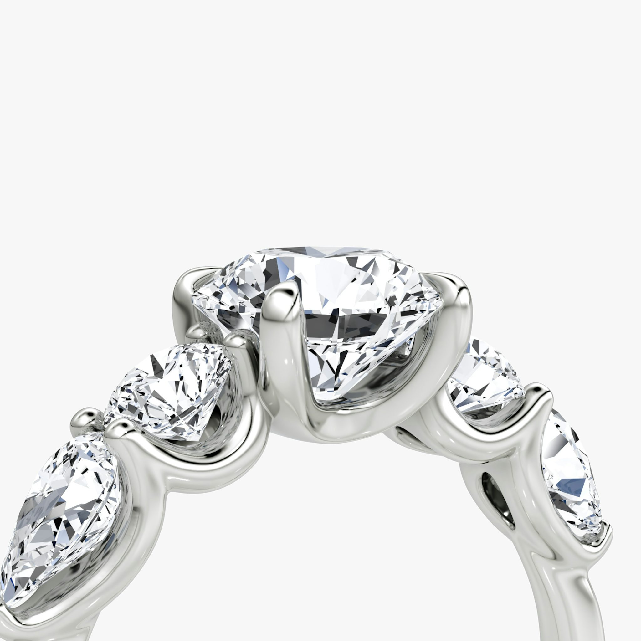 The Mixed Shape | Round Brilliant | Platinum | bandAccent: Plain | caratWeight: 1.0ct | sideStoneOrientation: horizontal | sideStoneShape: Round Brilliant and Pear | diamondOrientation: vertical