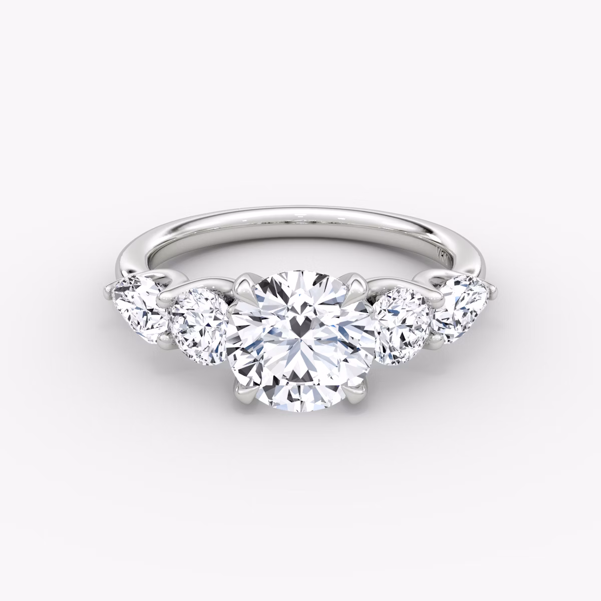 The Mixed Shape | Round Brilliant | 18k | White Gold | bandAccent: Plain | caratWeight: other | sideStoneOrientation: horizontal | sideStoneShape: Round Brilliant and Pear | diamondOrientation: vertical