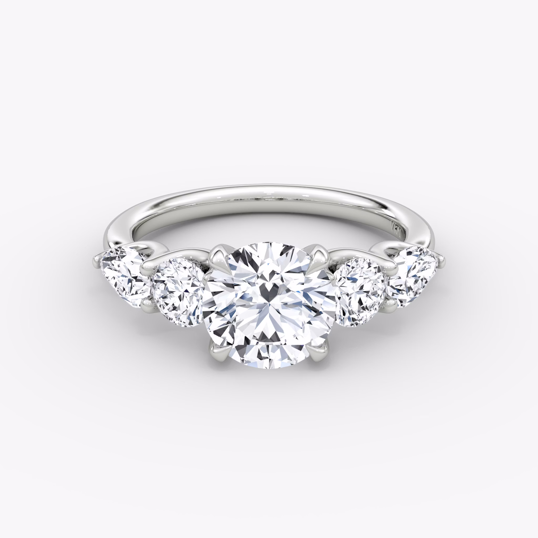 The Mixed Shape | Round Brilliant | Platinum | bandAccent: Plain | caratWeight: 1.0ct | sideStoneOrientation: horizontal | sideStoneShape: Round Brilliant and Pear | diamondOrientation: vertical