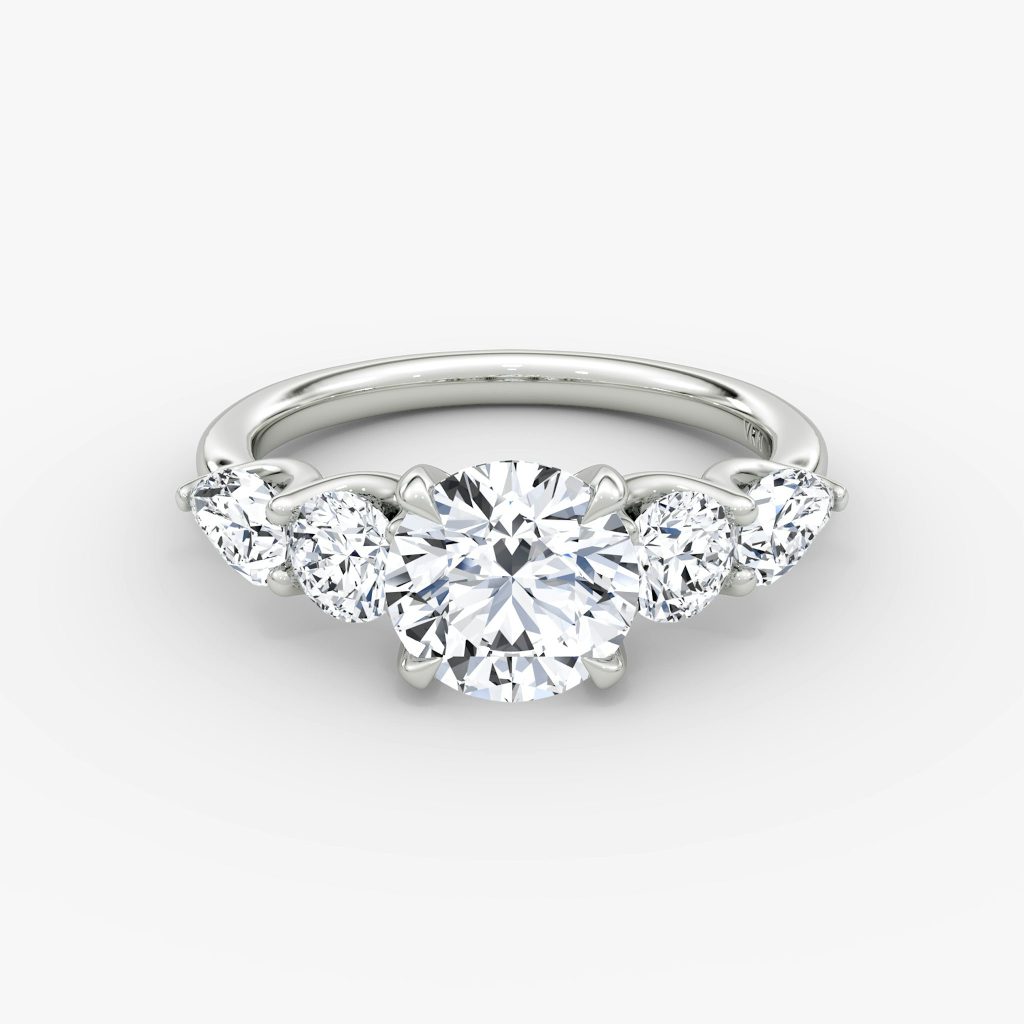The Mixed Shape | Round Brilliant | Platinum | bandAccent: Plain | caratWeight: 1.0ct | sideStoneOrientation: horizontal | sideStoneShape: Round Brilliant and Pear | diamondOrientation: vertical