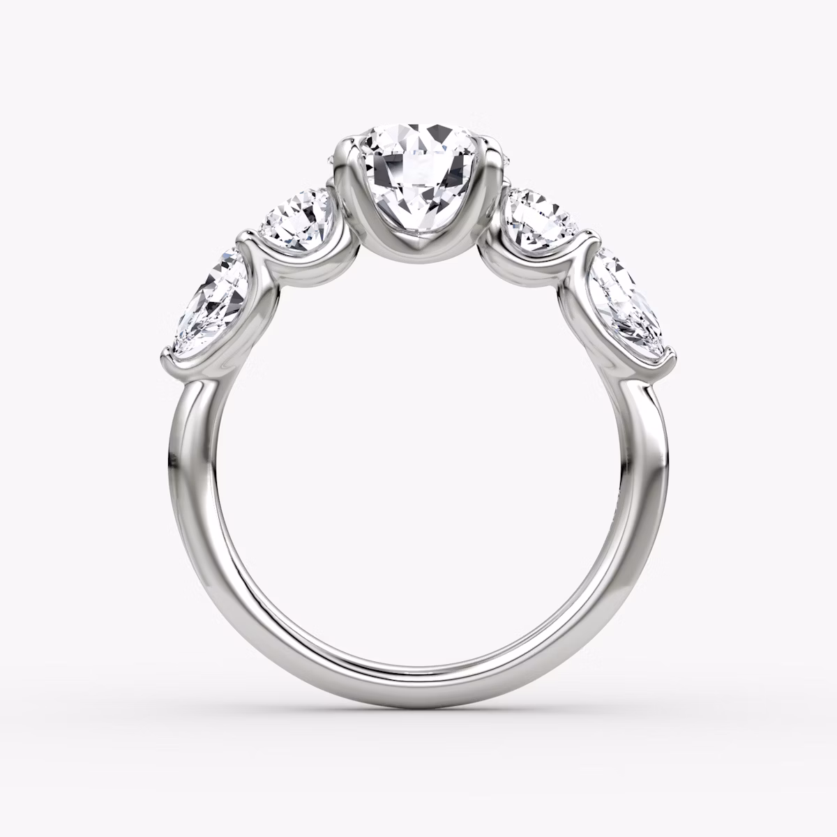 The Mixed Shape | Round Brilliant | 18k | White Gold | bandAccent: Plain | caratWeight: other | sideStoneOrientation: horizontal | sideStoneShape: Round Brilliant and Pear | diamondOrientation: vertical