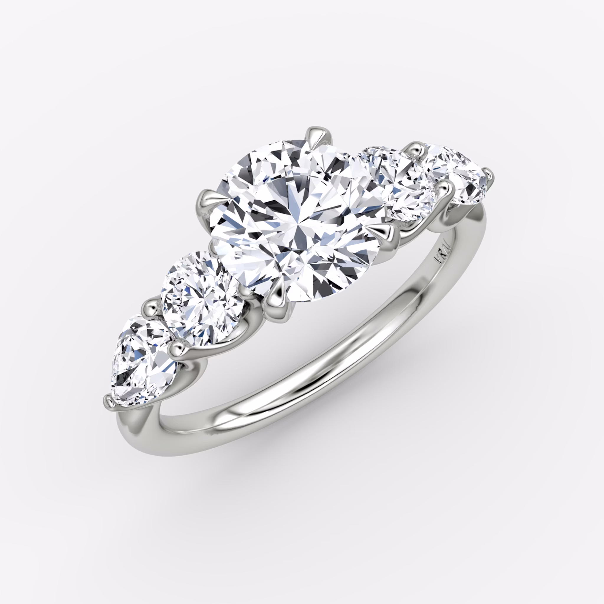 The Mixed Shape | Round Brilliant | Platinum | bandAccent: Plain | caratWeight: 1.0ct | sideStoneOrientation: horizontal | sideStoneShape: Round Brilliant and Pear | diamondOrientation: vertical