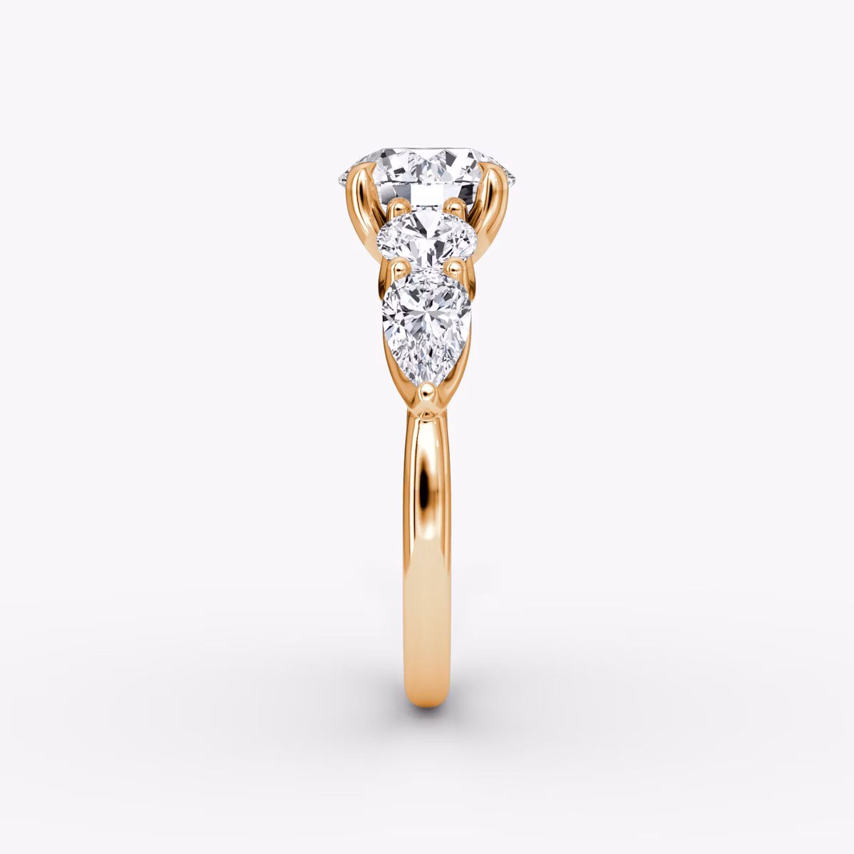 The Mixed Shape | Round Brilliant | 14k | Rose Gold | bandAccent: Plain | caratWeight: 1.0ct | sideStoneOrientation: horizontal | sideStoneShape: Round Brilliant and Pear | diamondOrientation: vertical
