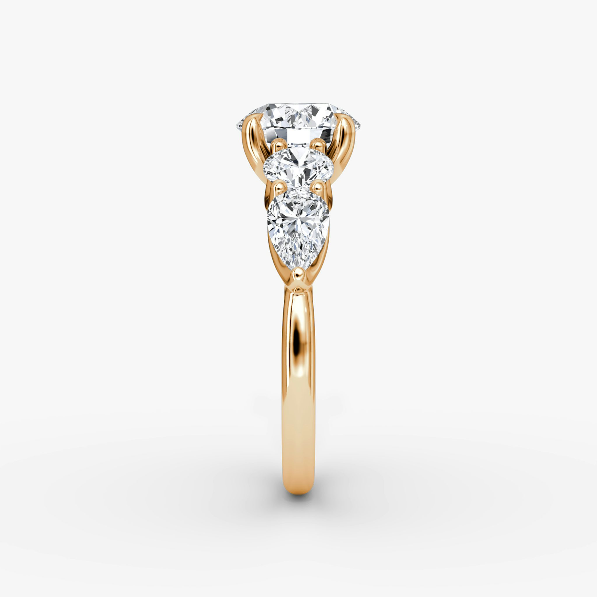 The Mixed Shape | Round Brilliant | 14k | Rose Gold | bandAccent: Plain | caratWeight: other | sideStoneOrientation: horizontal | sideStoneShape: Round Brilliant and Pear | diamondOrientation: vertical