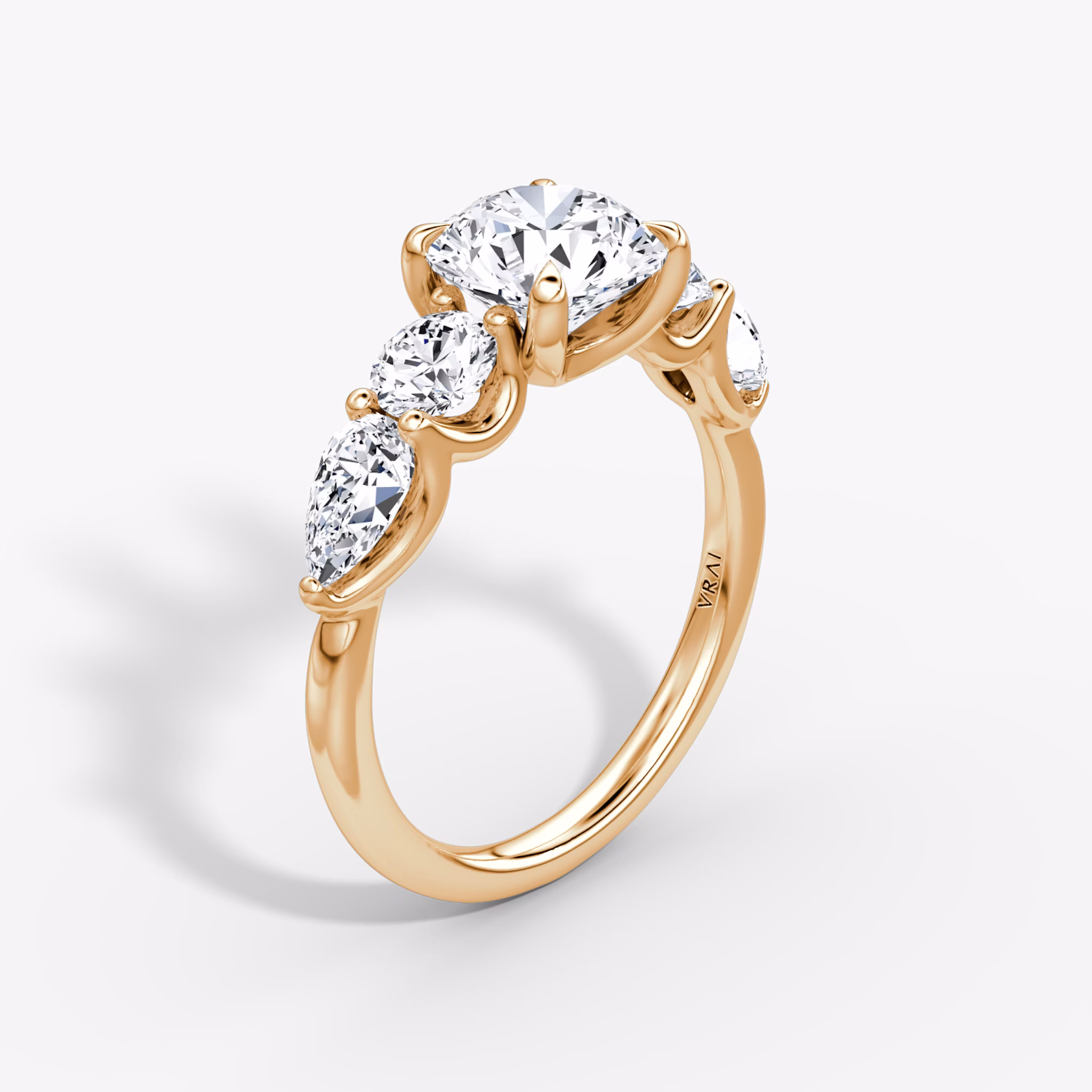 The Mixed Shape | Round Brilliant | 14k | Rose Gold | bandAccent: Plain | caratWeight: other | sideStoneOrientation: horizontal | sideStoneShape: Round Brilliant and Pear | diamondOrientation: vertical