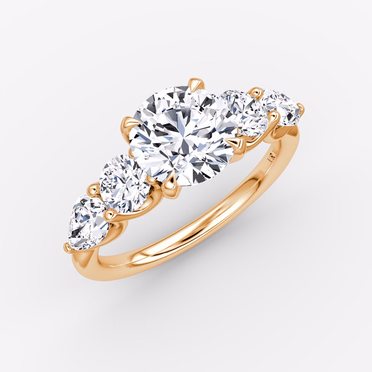 The Mixed Shape | Round Brilliant | 14k | Rose Gold | bandAccent: Plain | caratWeight: 1.0ct | sideStoneOrientation: horizontal | sideStoneShape: Round Brilliant and Pear | diamondOrientation: vertical