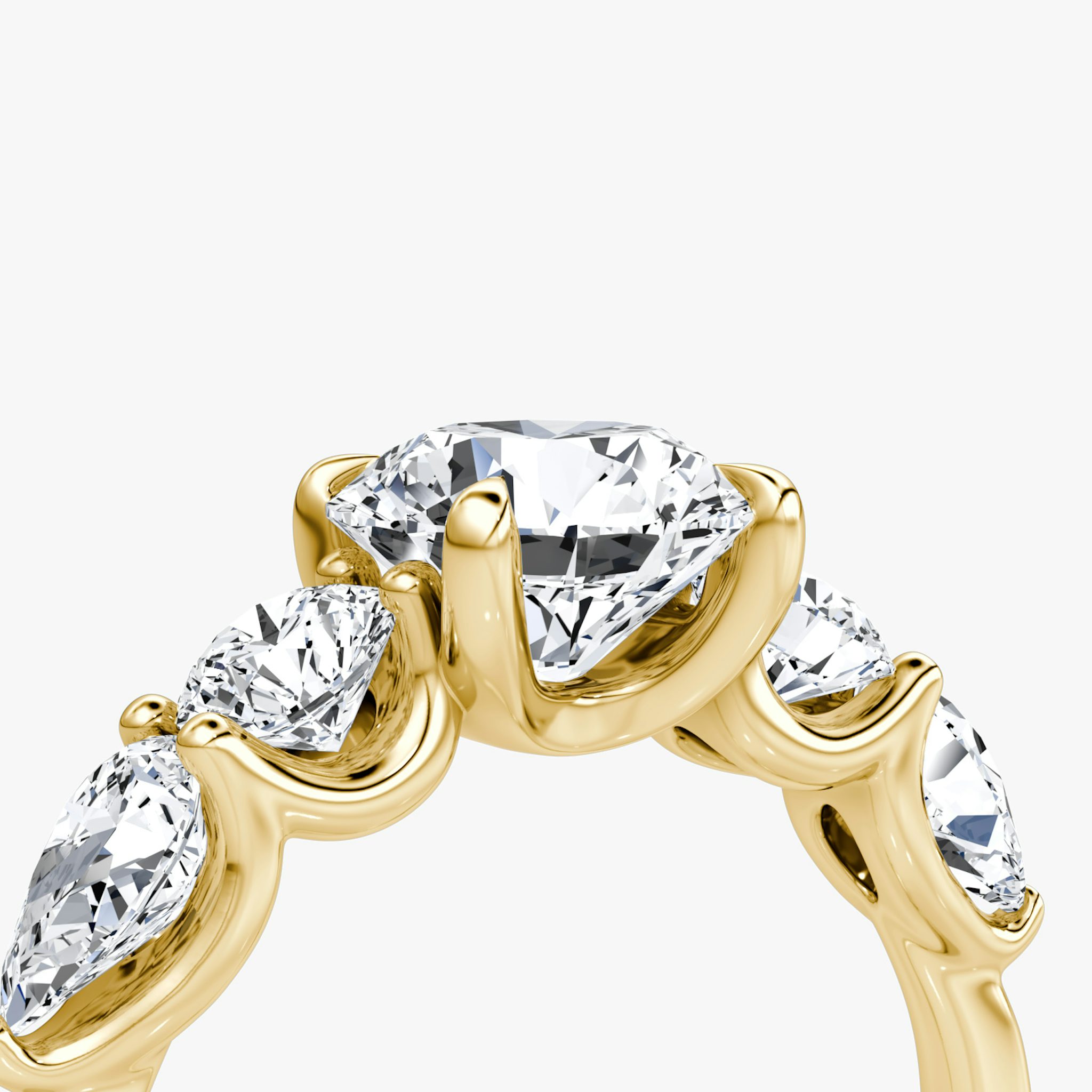 The Mixed Shape | Round Brilliant | 18k | Yellow Gold | bandAccent: Plain | caratWeight: other | sideStoneOrientation: horizontal | sideStoneShape: Round Brilliant and Pear | diamondOrientation: vertical