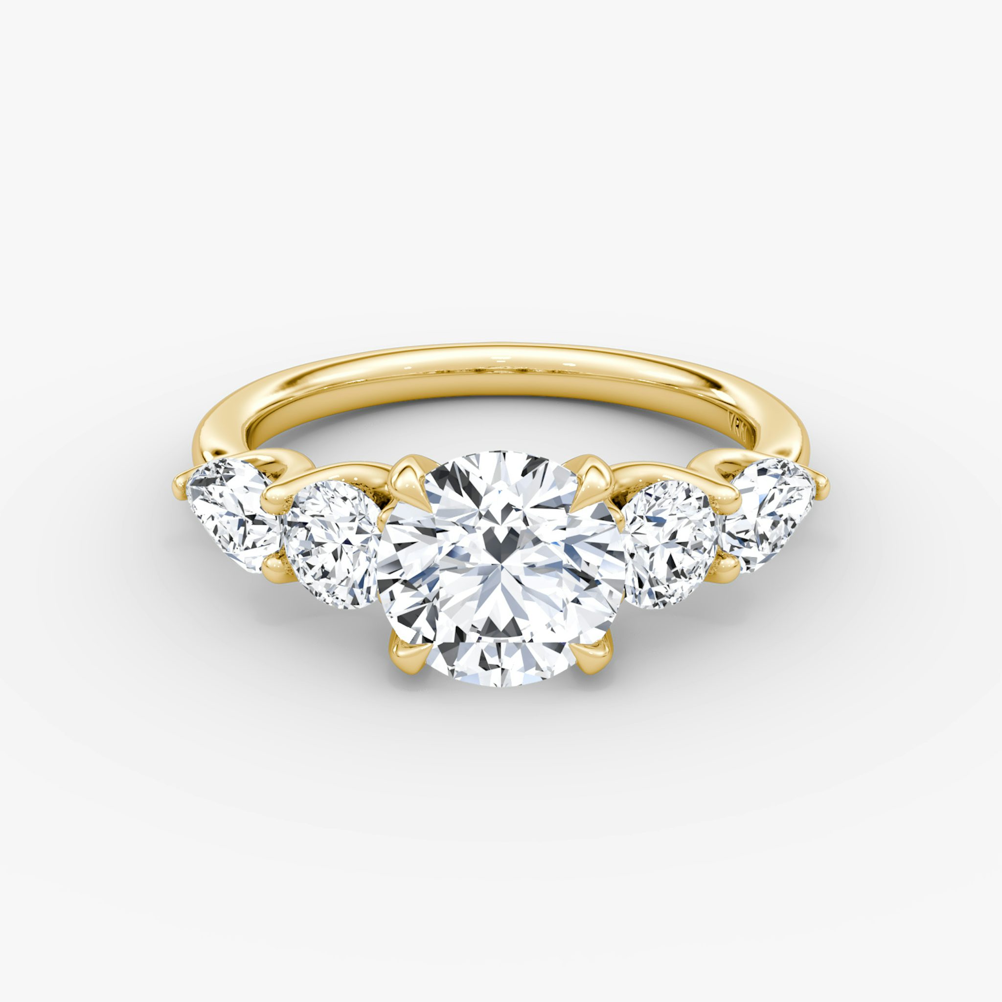 The Mixed Shape | Round Brilliant | 18k | Yellow Gold | bandAccent: Plain | caratWeight: other | sideStoneOrientation: horizontal | sideStoneShape: Round Brilliant and Pear | diamondOrientation: vertical
