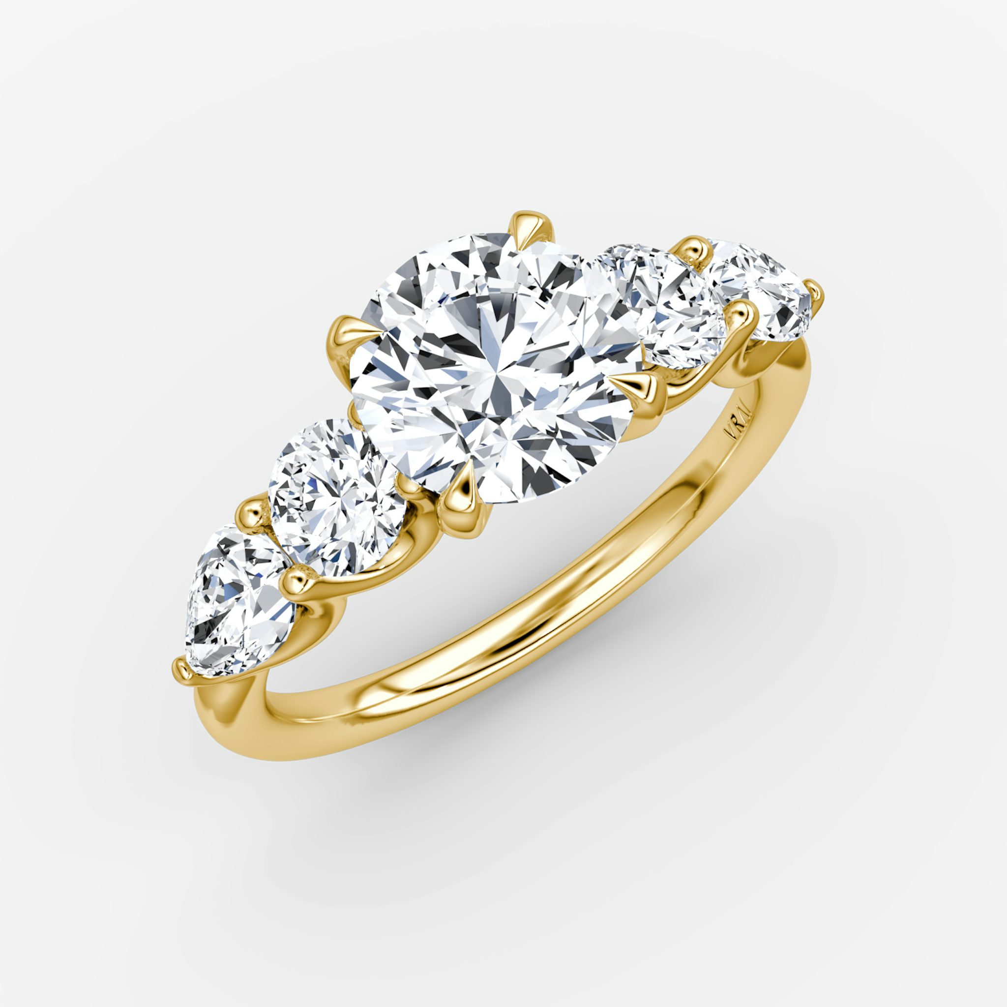 The Mixed Shape | Round Brilliant | 18k | Yellow Gold | bandAccent: Plain | caratWeight: other | sideStoneOrientation: horizontal | sideStoneShape: Round Brilliant and Pear | diamondOrientation: vertical