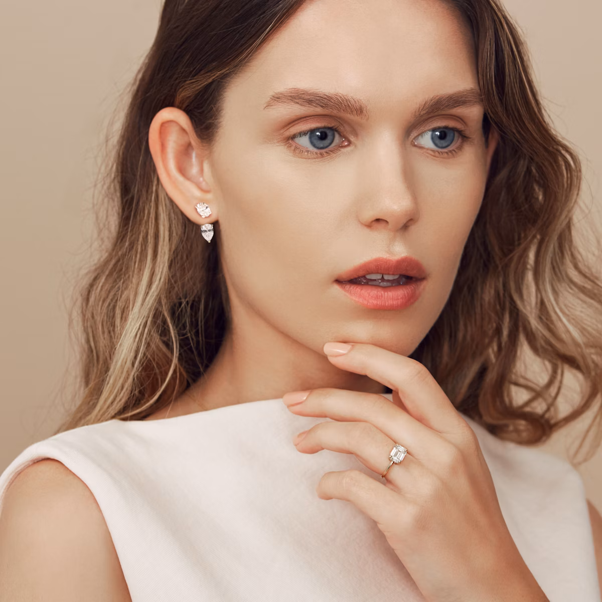 Solitaire Stud & Ear Jacket | 14k | White Gold | bottomDiamondShape: Pear | topDiamondShape: Oval | caratWeight: 1ct