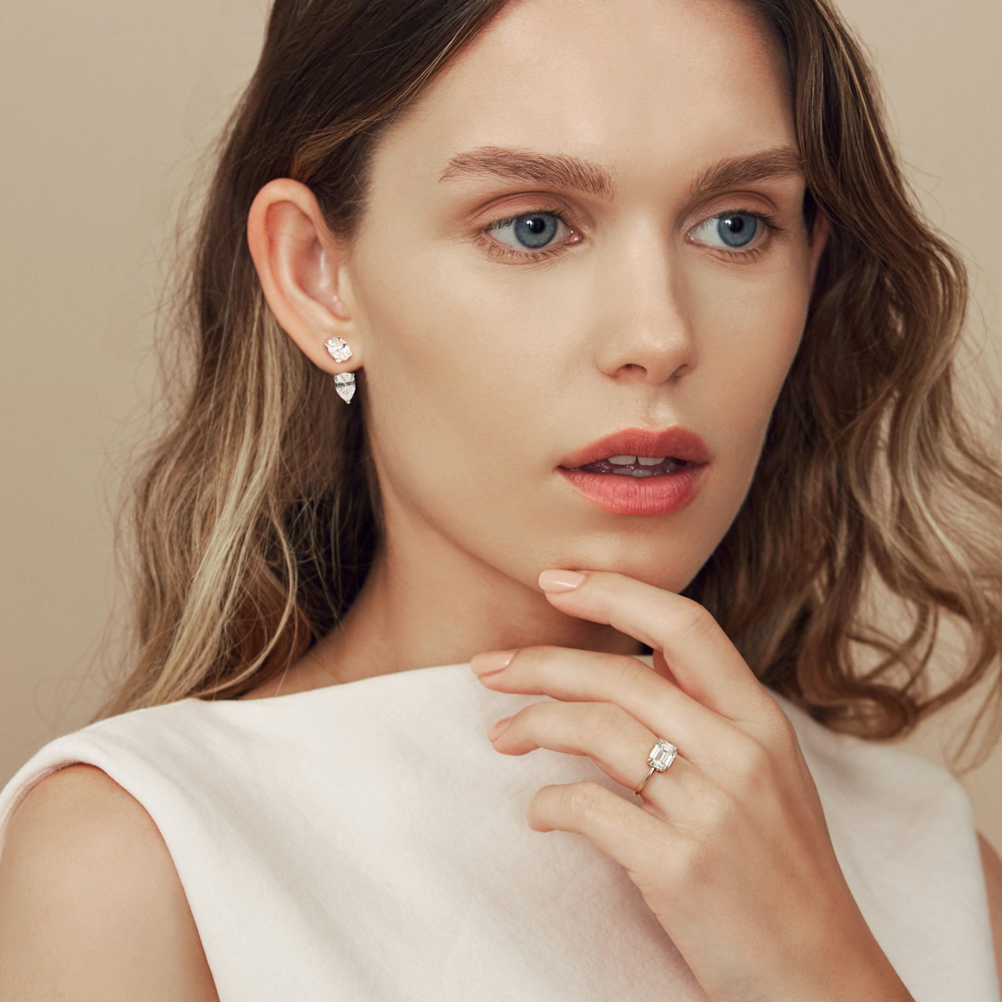 Solitaire Stud & Ear Jacket | 14k | White Gold | bottomDiamondShape: Pear | topDiamondShape: Oval | caratWeight: 2ct