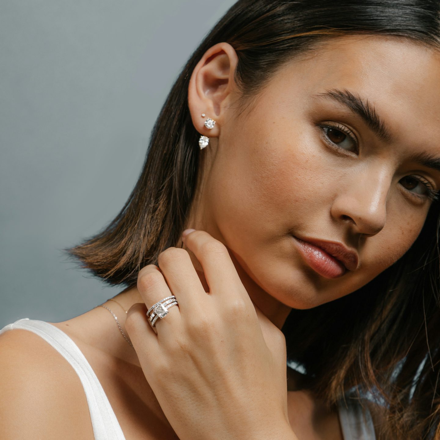 Solitaire Stud & Ear Jacket | 14k | White Gold | bottomDiamondShape: Pear | topDiamondShape: Round Brilliant | caratWeight: 1ct